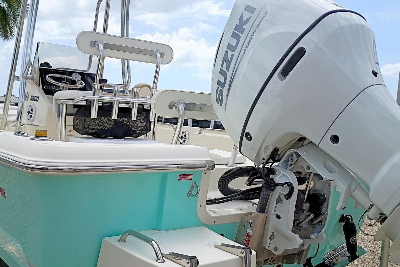 2023 Bulls Bay 2200 boat with Suzuki outboard motor, featuring sleek design and modern amenities.