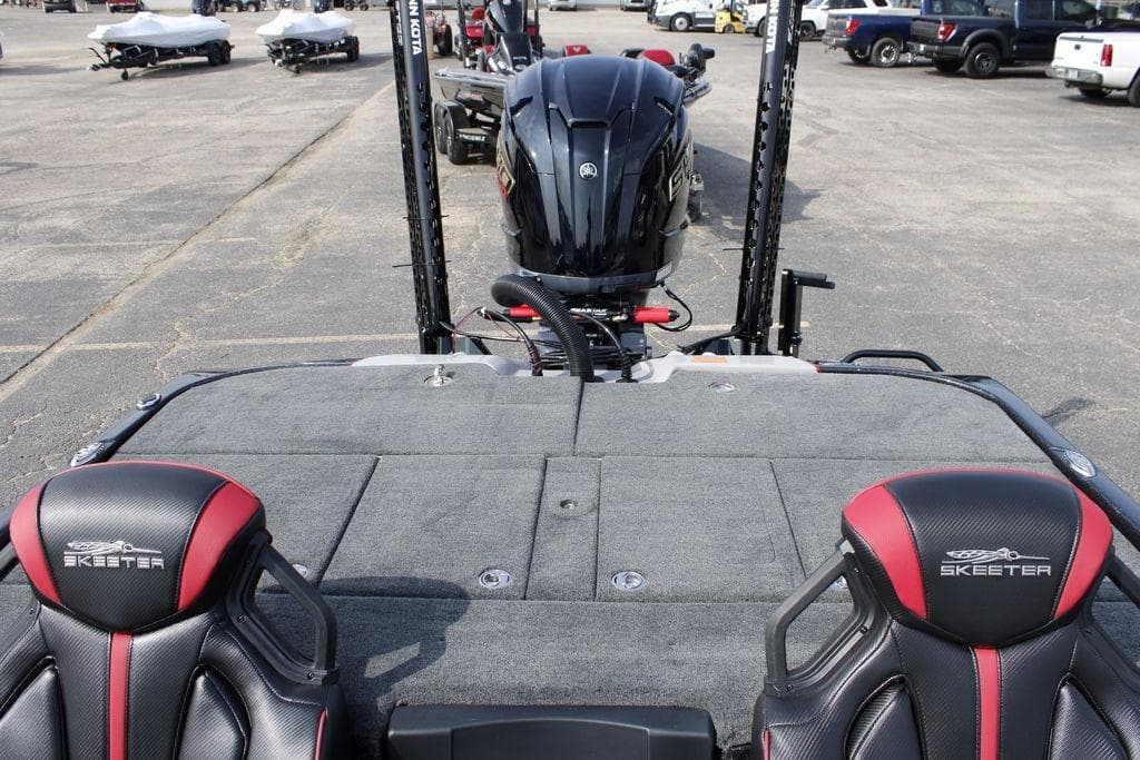 2026 Skeeter ZXE21 boat interior with dual seats and powerful outboard motor.