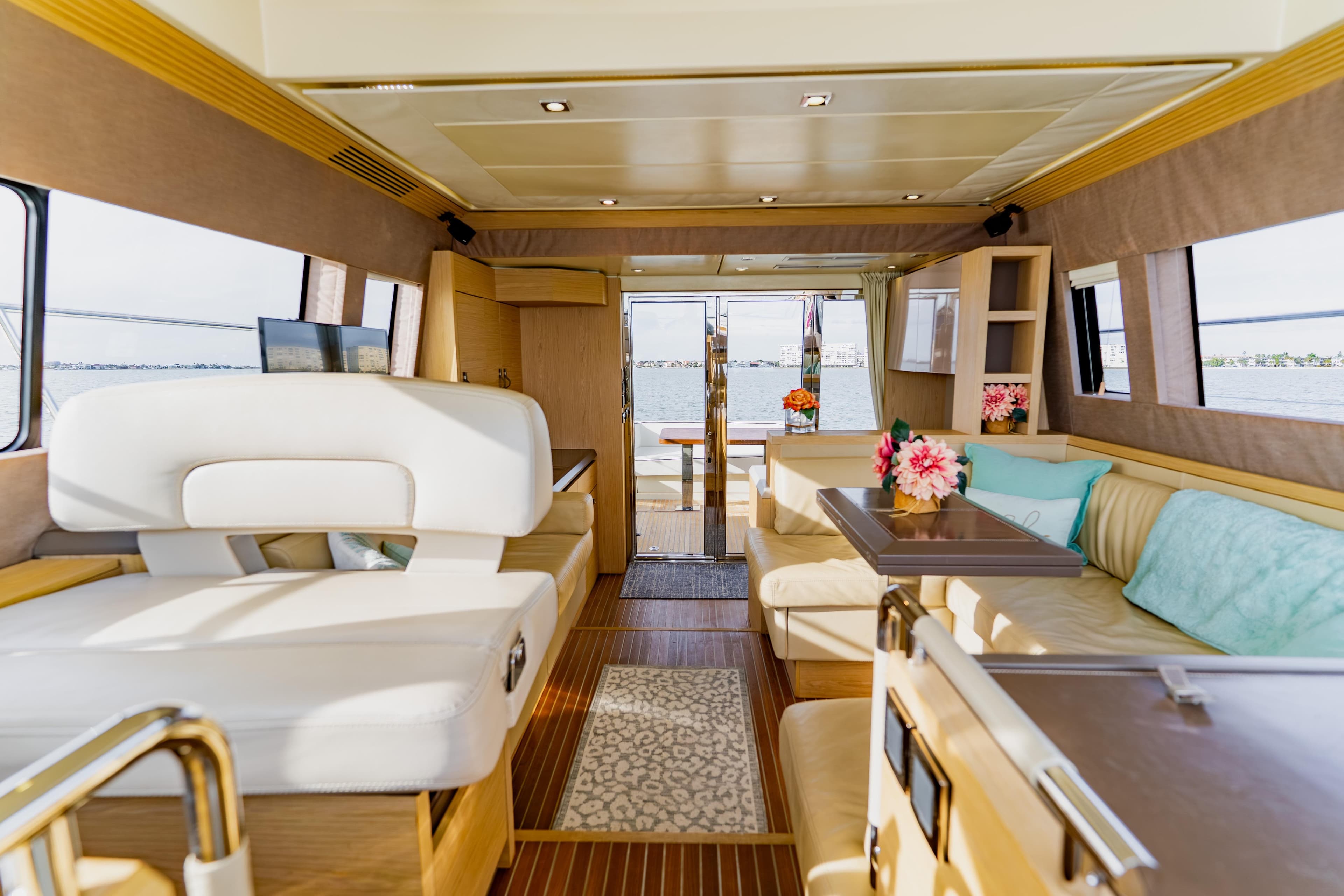 Luxurious interior of 2015 Monte Carlo MC5 yacht with elegant seating and decor.