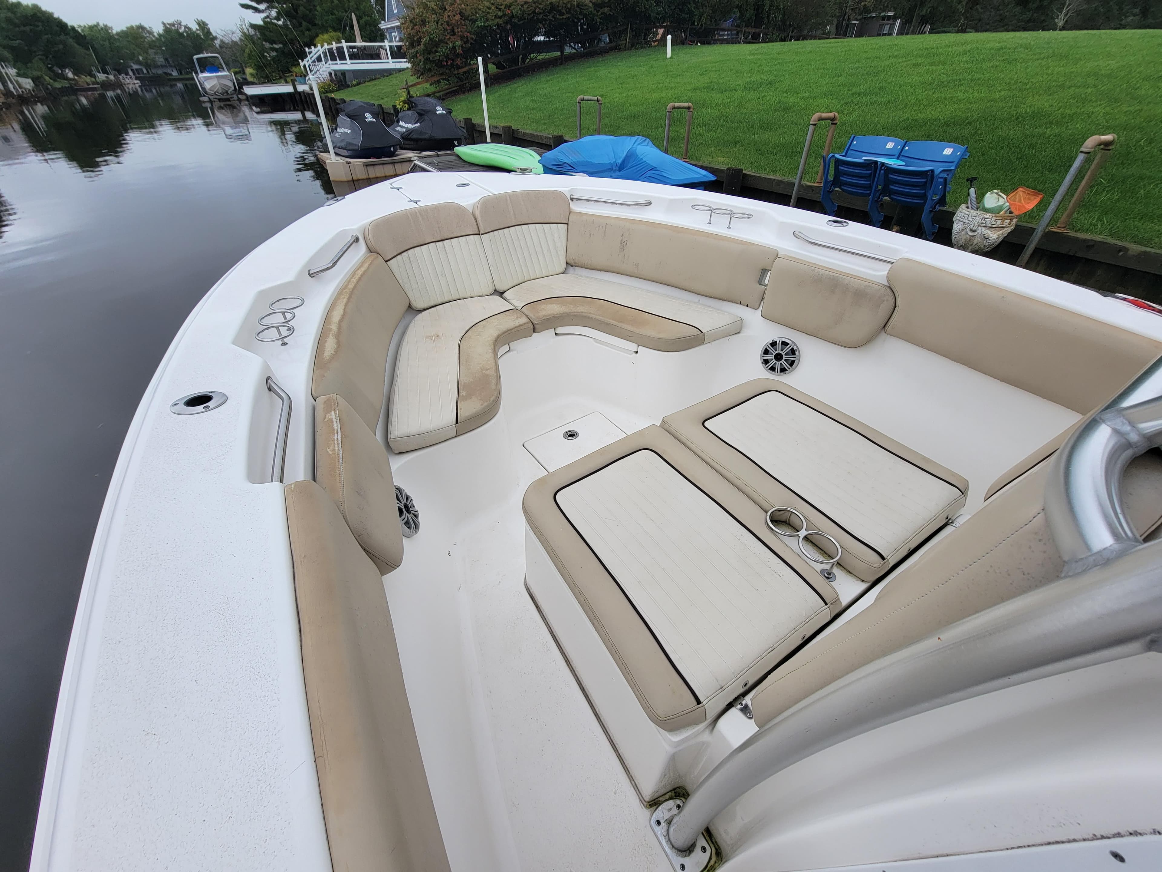 2016 Sea Fox 266 Commander boat with spacious seating and cup holders.