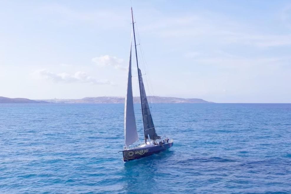 Sailing yacht "Green Marine Volvo Ocean 70" on open sea, 2005 model.