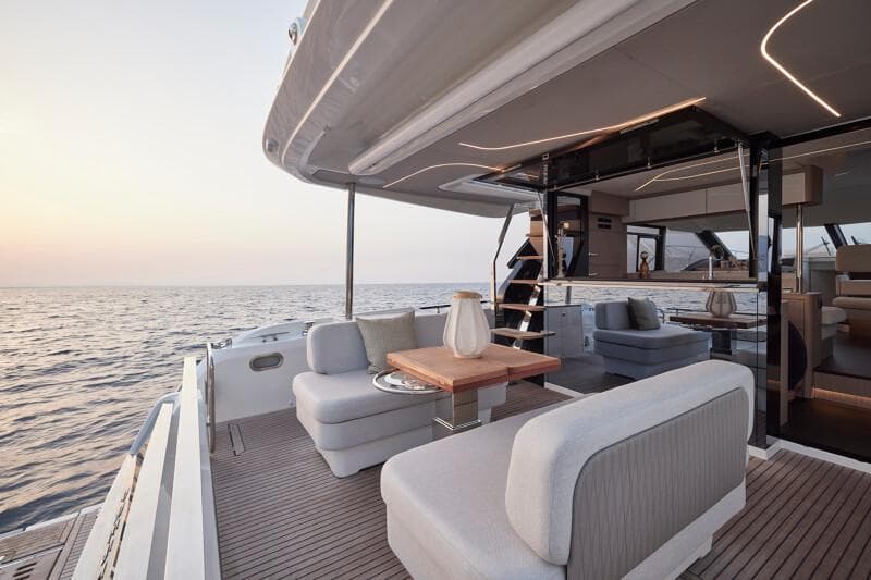 Luxurious Prestige F5.7 yacht deck with elegant seating, ocean view, and modern design, 2026 model.