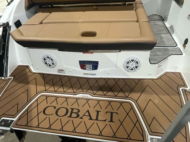 2024 Cobalt R6 boat with brown deck and speakers.