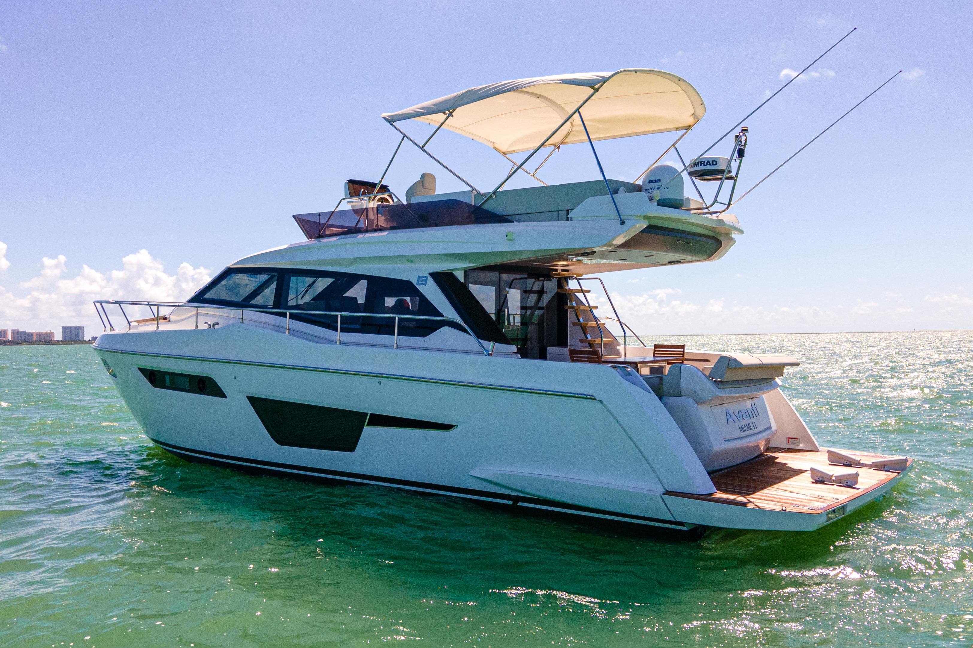 2022 Ferretti Yachts 500 cruising on open water under clear skies.