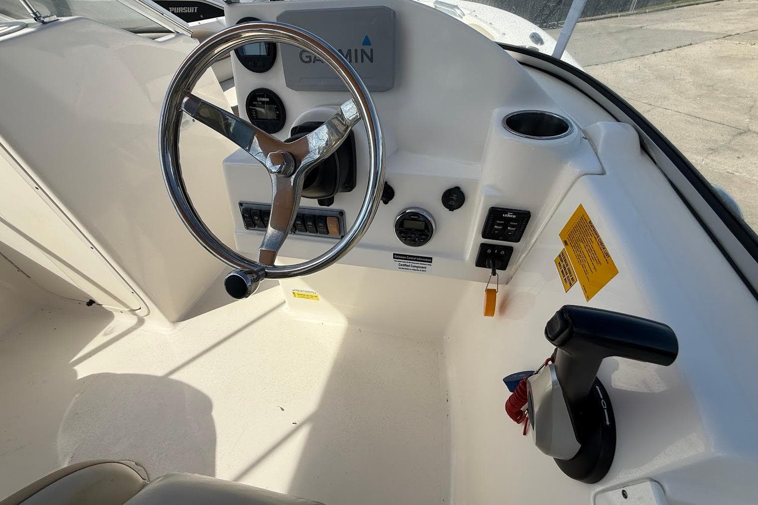 Steering console of 2019 Key West 203 DFS boat with Garmin navigation system.
