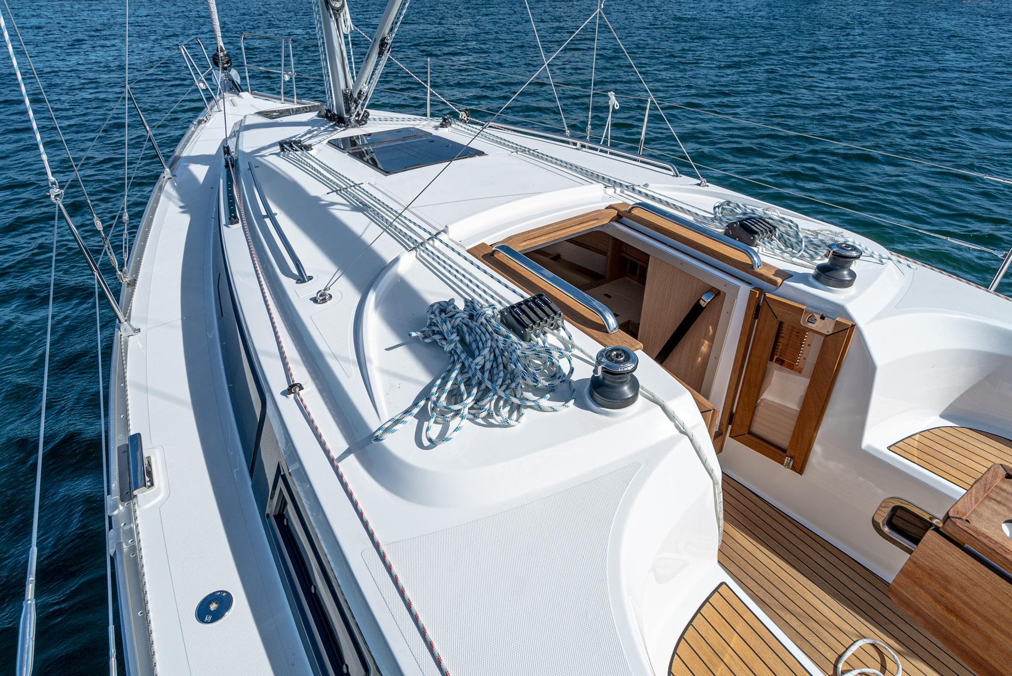 2024 Bavaria Cruiser 34 sailboat deck with open cabin and rigging.
