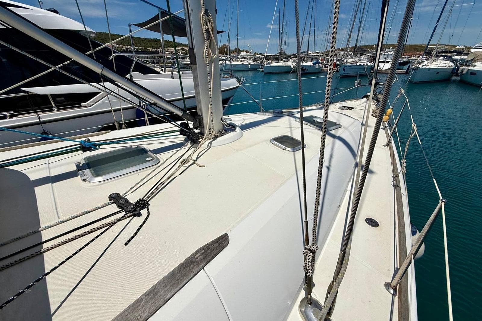 Deck view of 2008 Jeanneau Sun Odyssey 45 sailboat in marina.