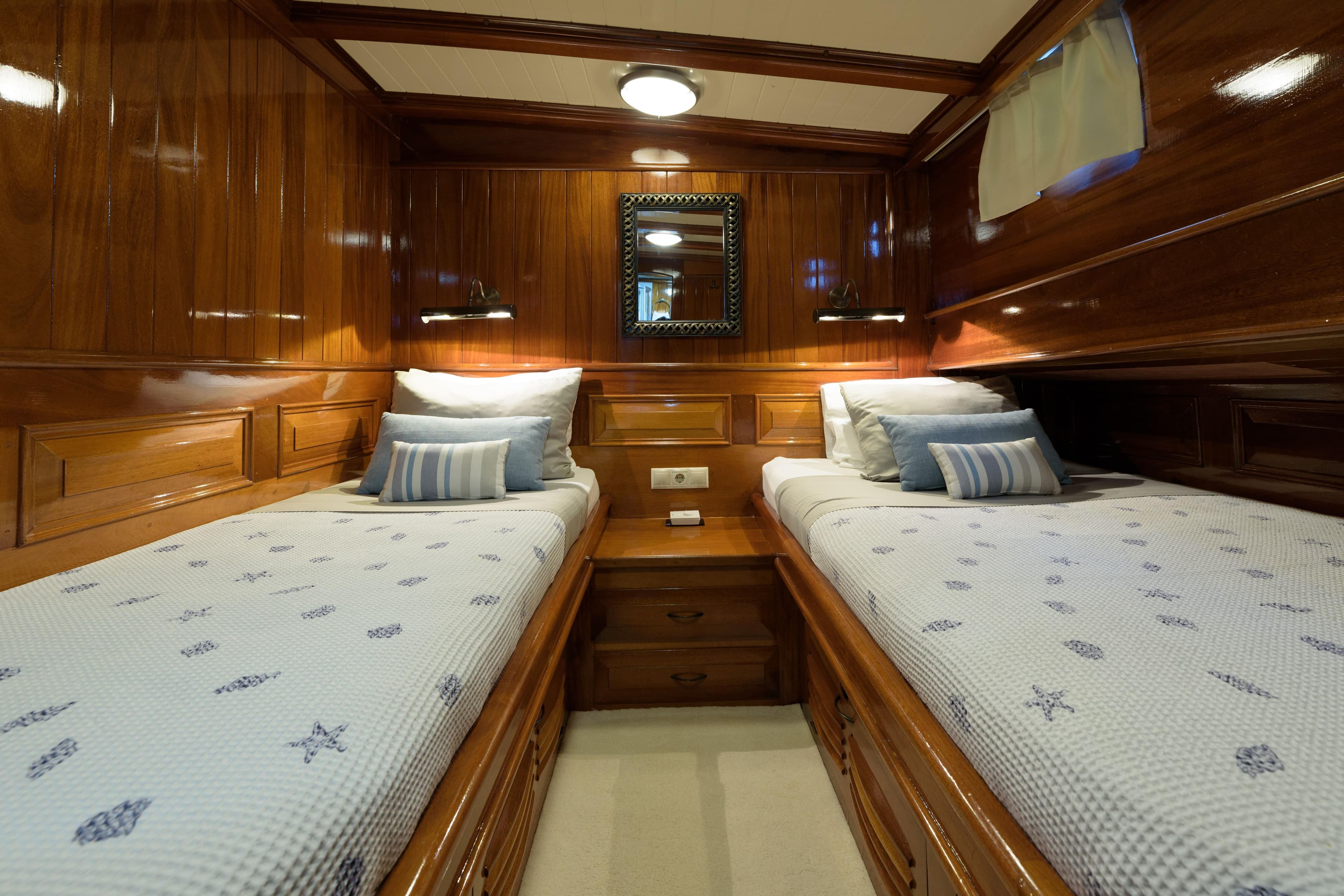 Luxurious twin cabin with wooden interior on 2004 Su Marine Gulet yacht.