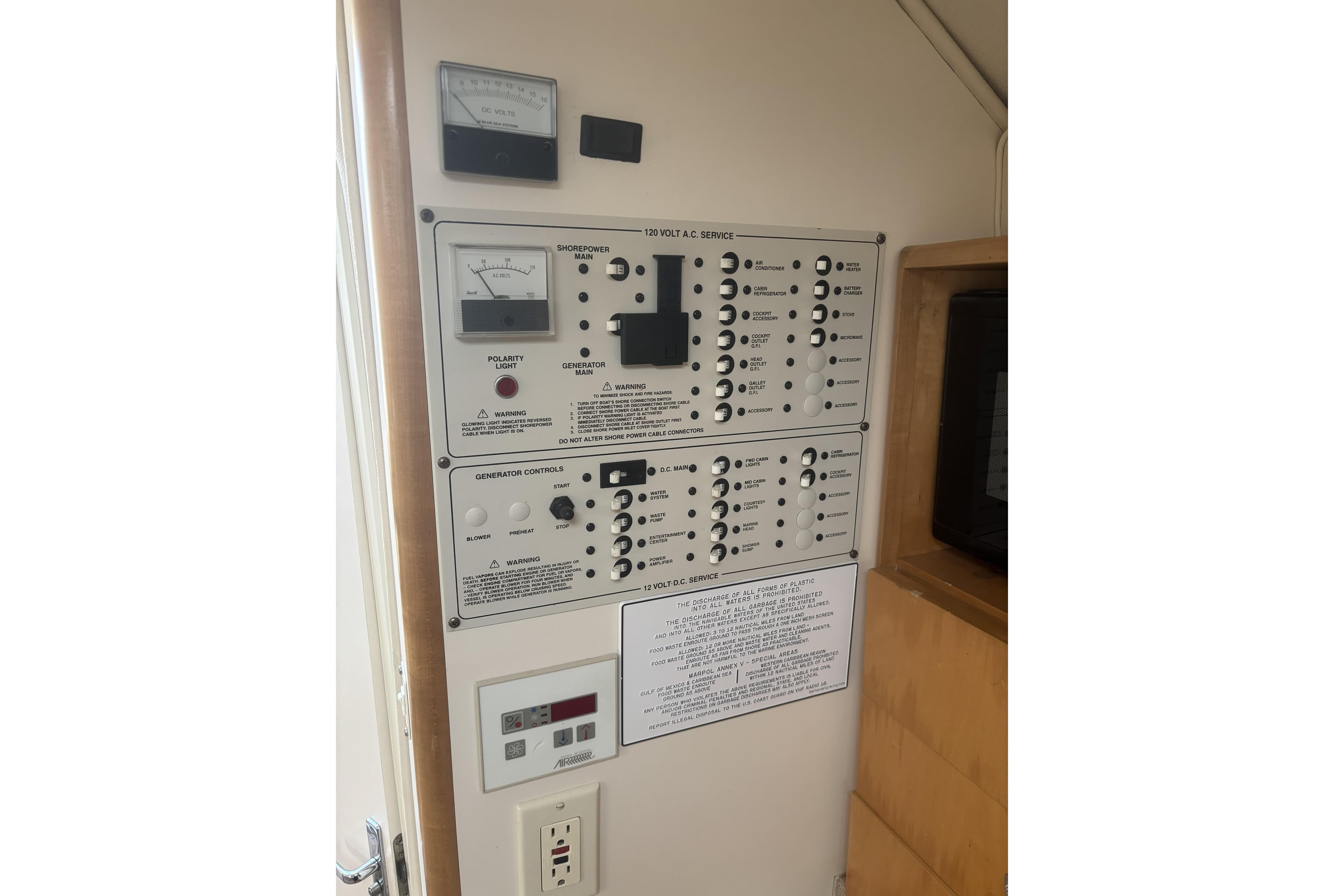 Electrical control panel in a 2000 Larson Cabrio 330 Mid Cabin boat.