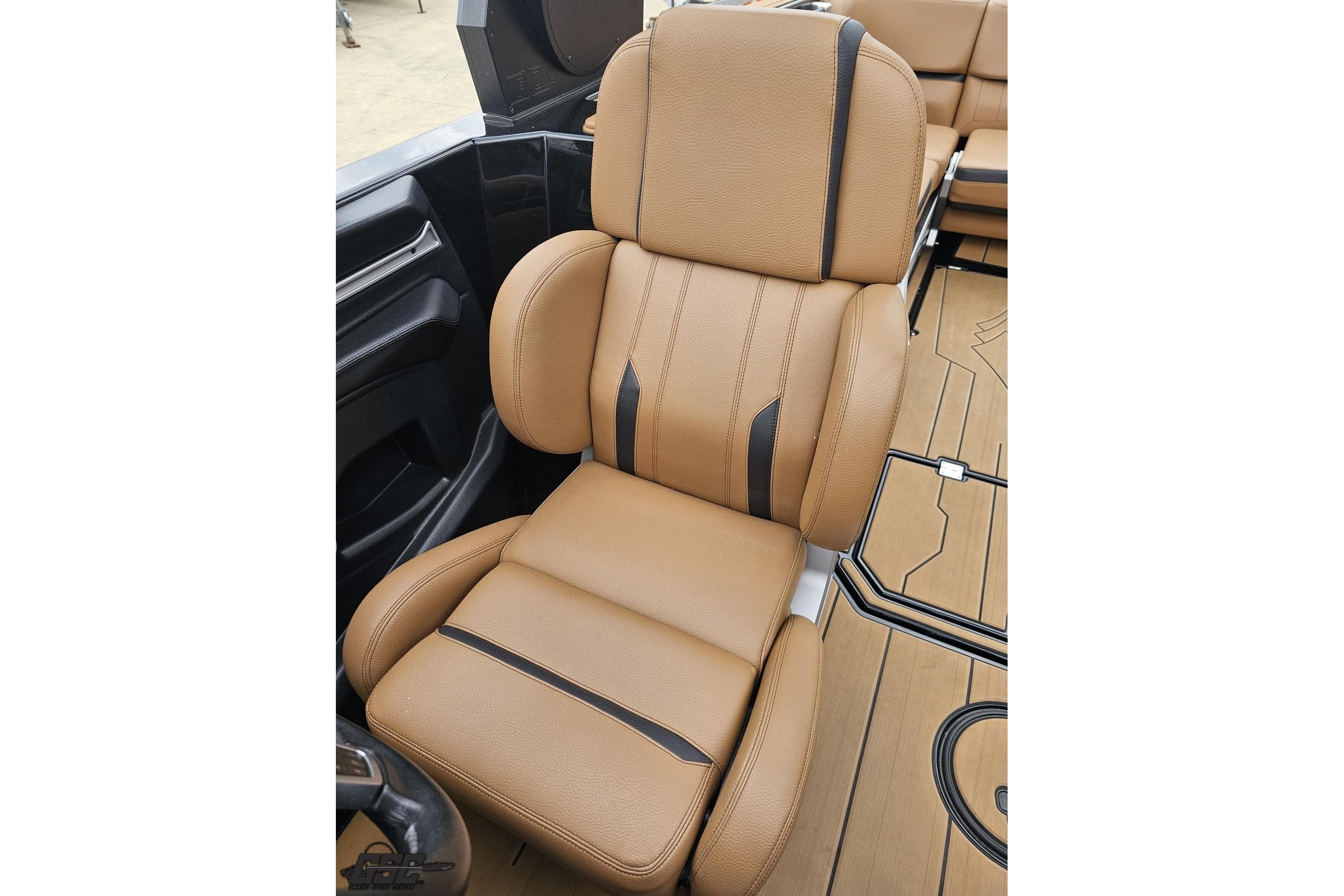 Luxurious tan leather seat in 2022 Supra SE 550 boat interior.