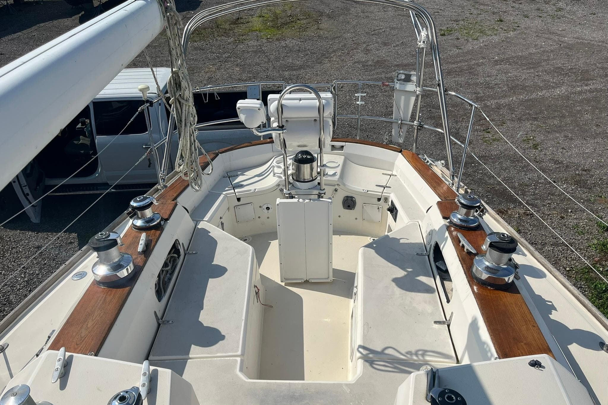 1987 Sabre 42 sailboat cockpit with winches and steering wheel, viewed from above.