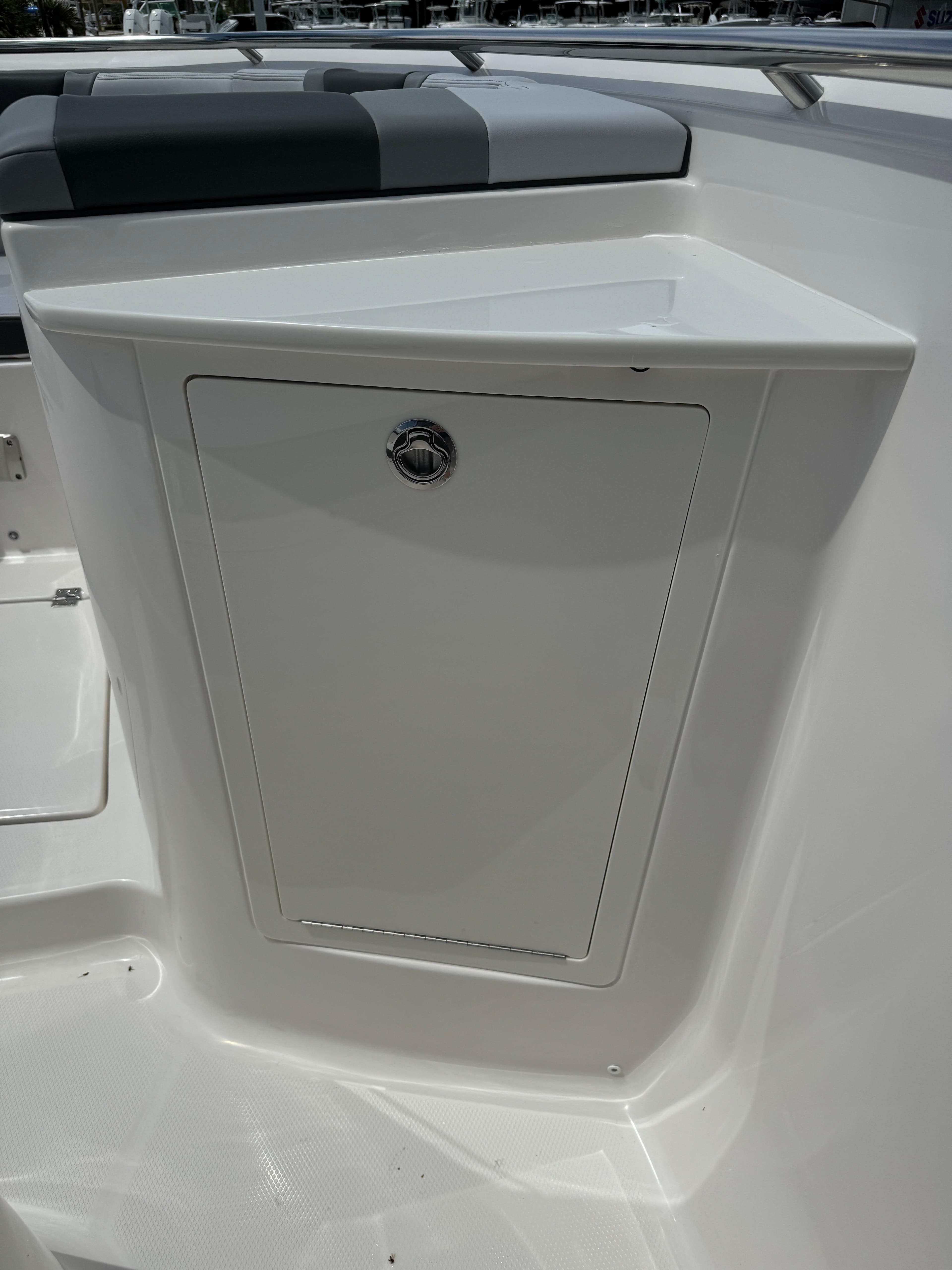 2025 Robalo R360 Center Console boat storage compartment with sleek design.