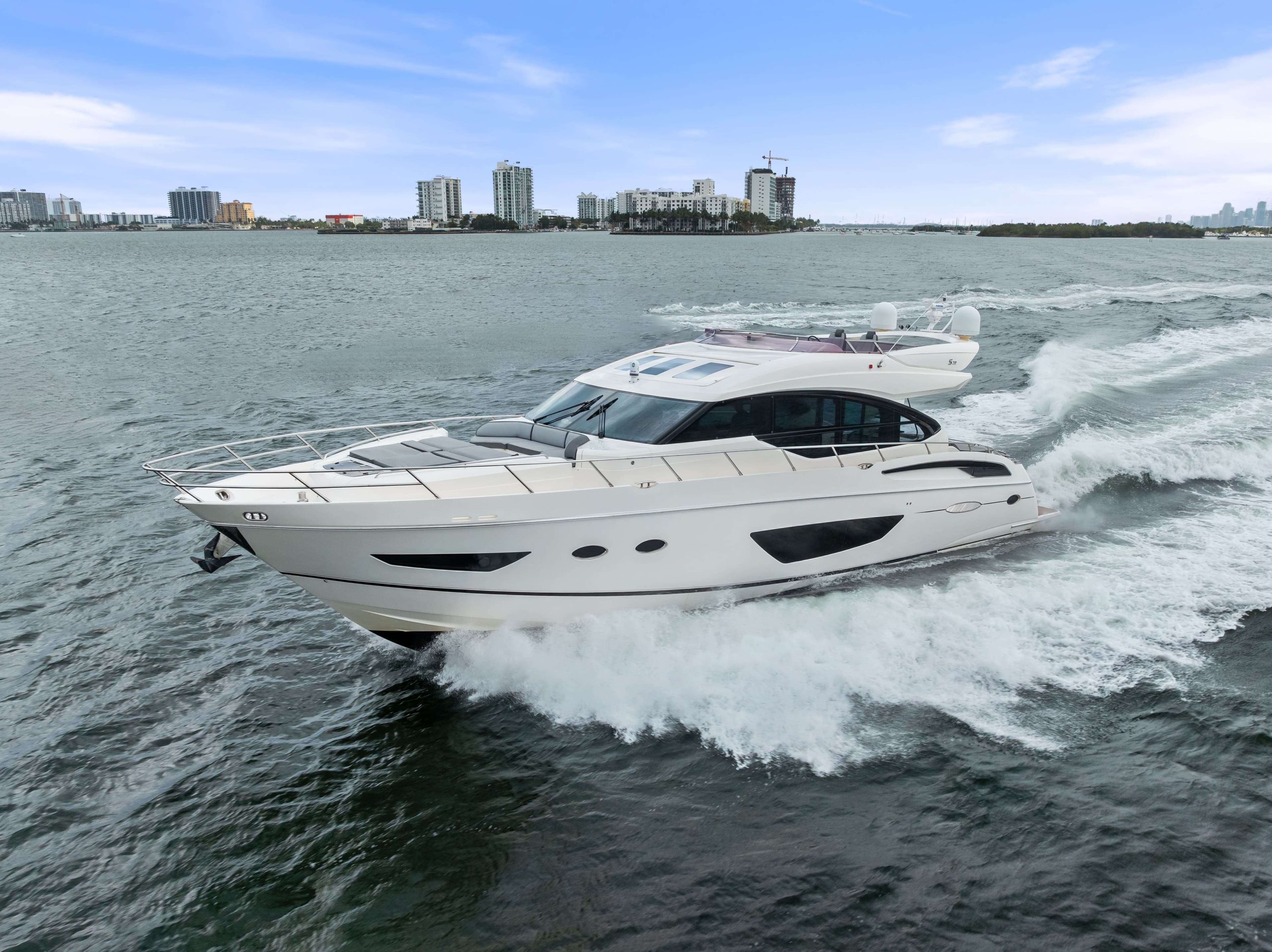 2014 Princess S72 luxury yacht cruising on water.