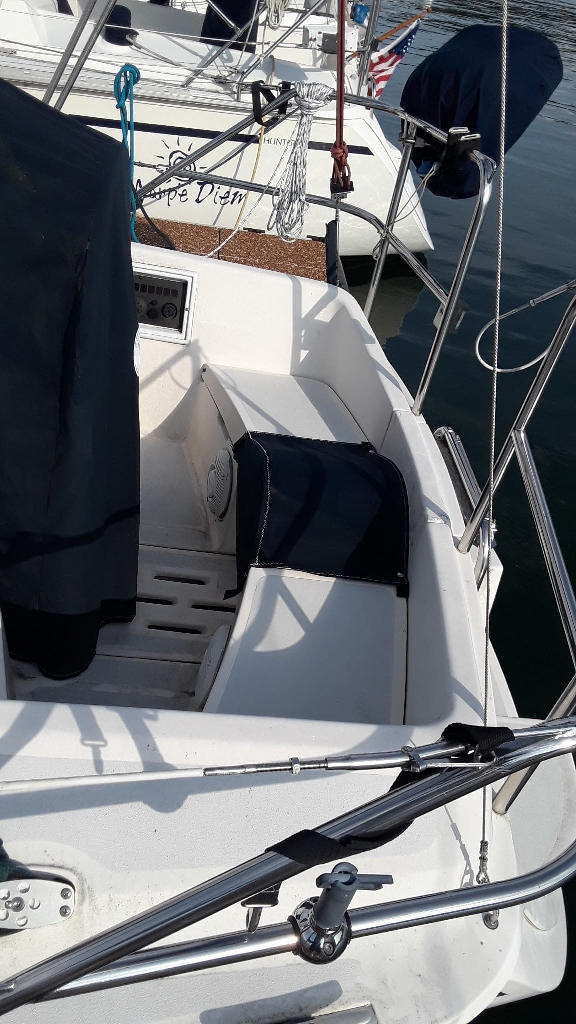 1990 Hunter 28 sailboat cockpit with seating and nautical equipment.