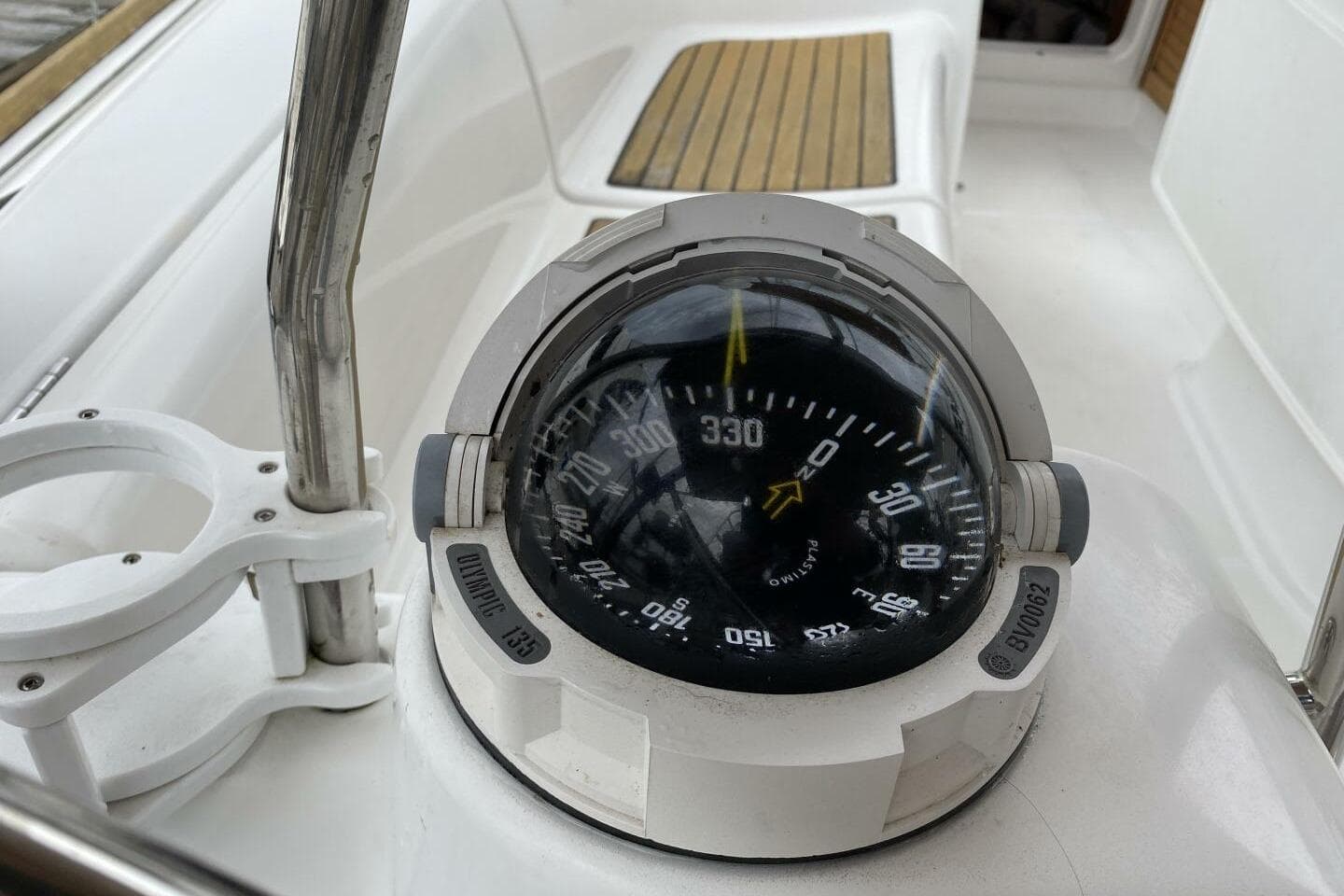 Compass on 2009 Beneteau 43 yacht, showing direction 330 degrees.