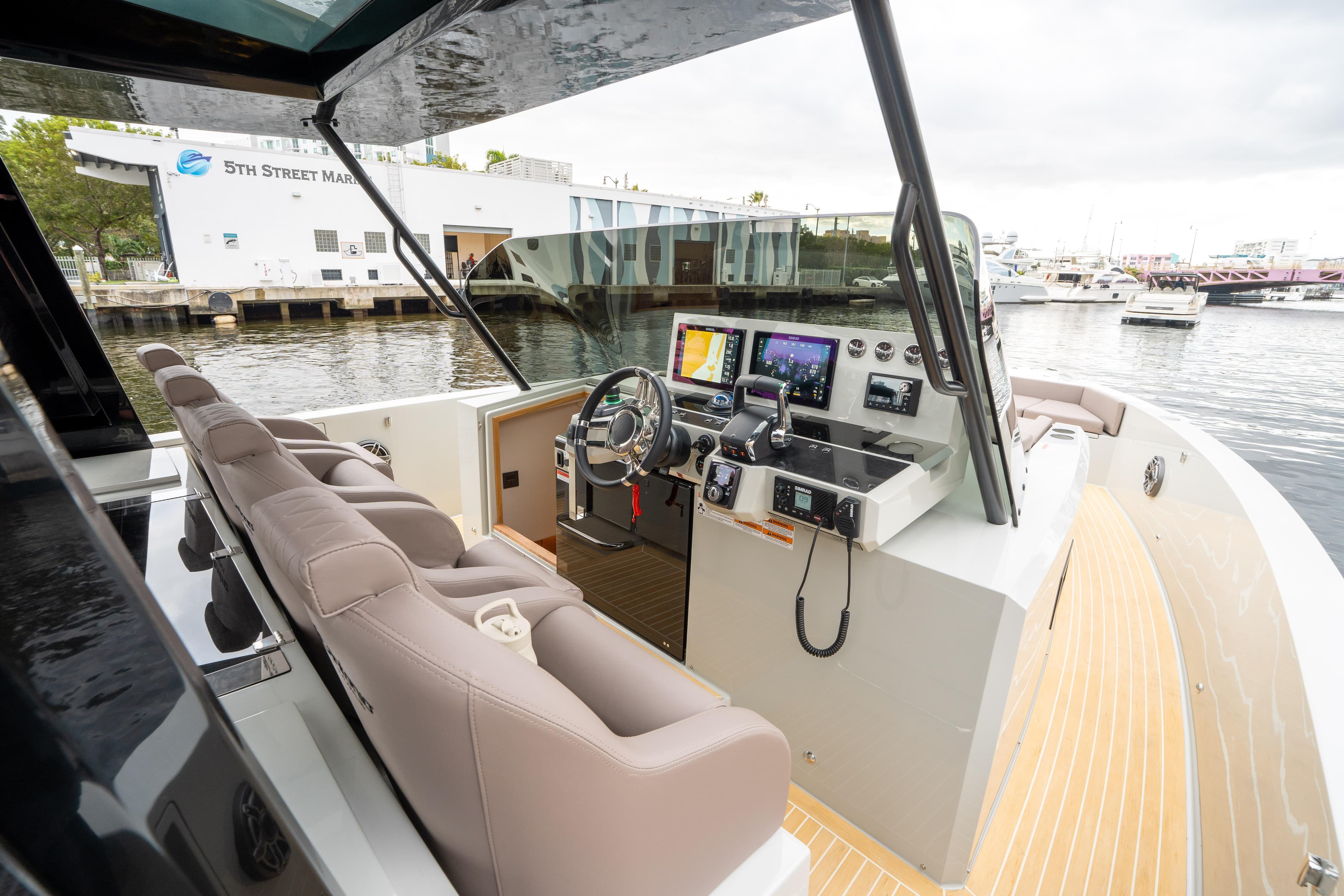 2025 De Antonio Yachts D42 Open cockpit with modern navigation equipment and luxurious seating.