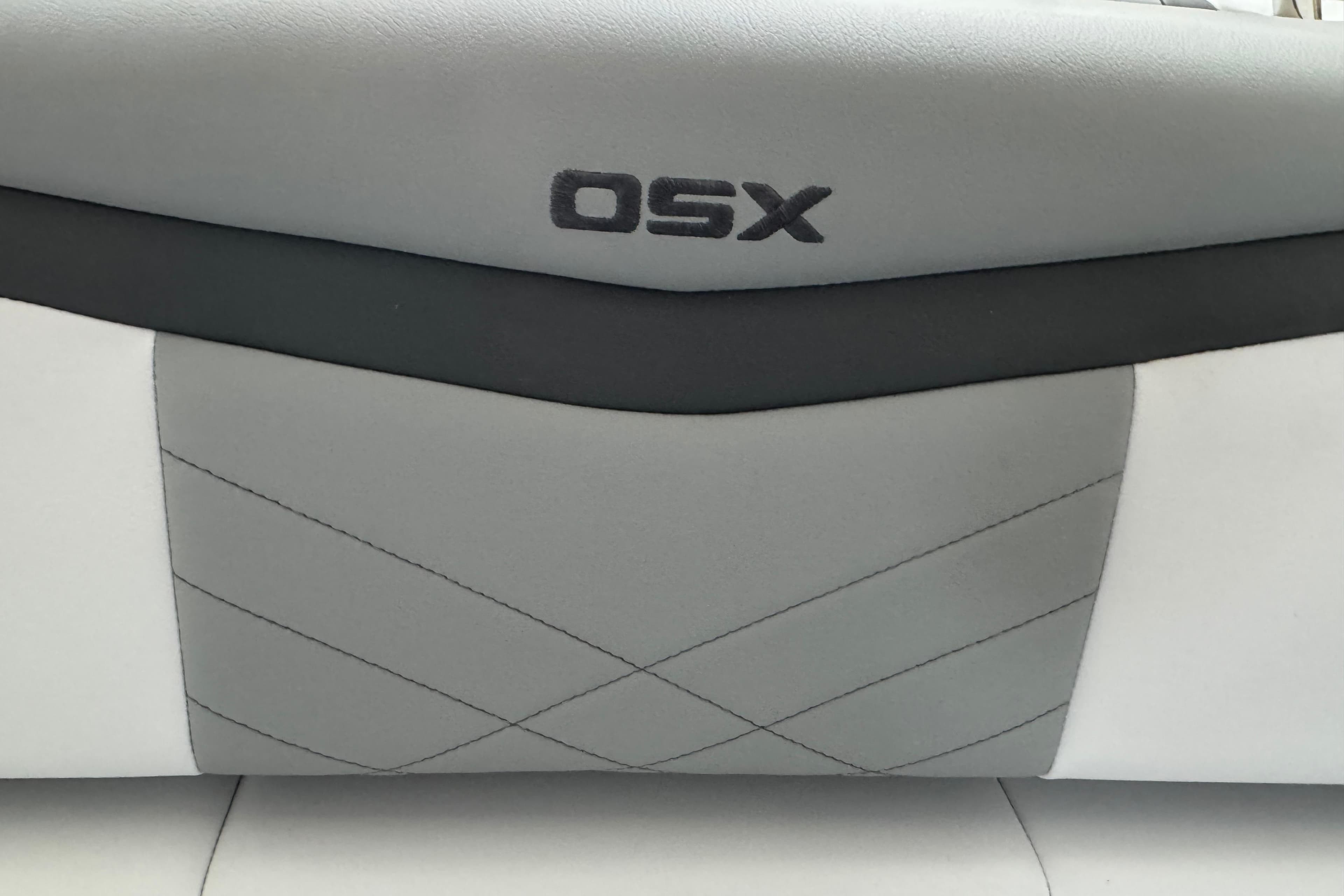 2026 Chaparral 270 OSX boat interior with sleek gray upholstery design.