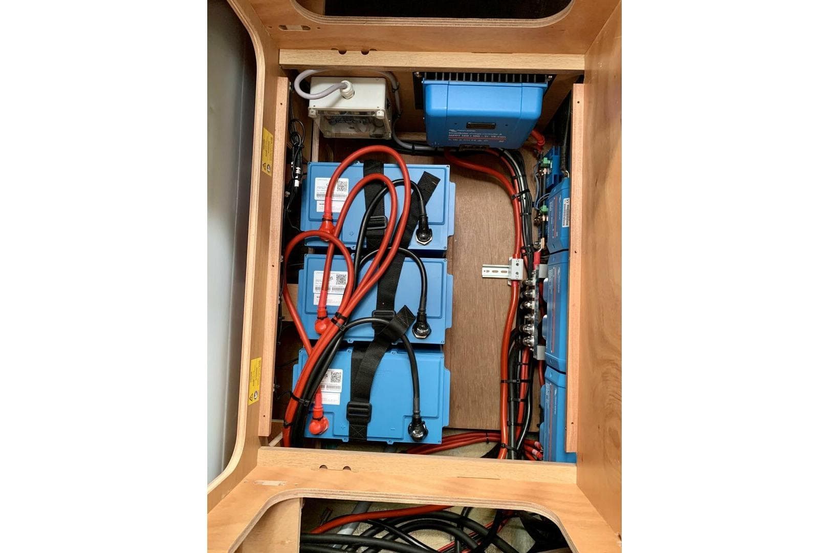 Electrical system setup in a 2023 Excess 14, featuring batteries and wiring.