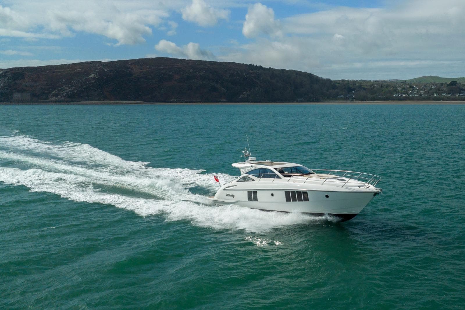 Luxury Windy 46 Chinook yacht cruising on open water, 2019 model.