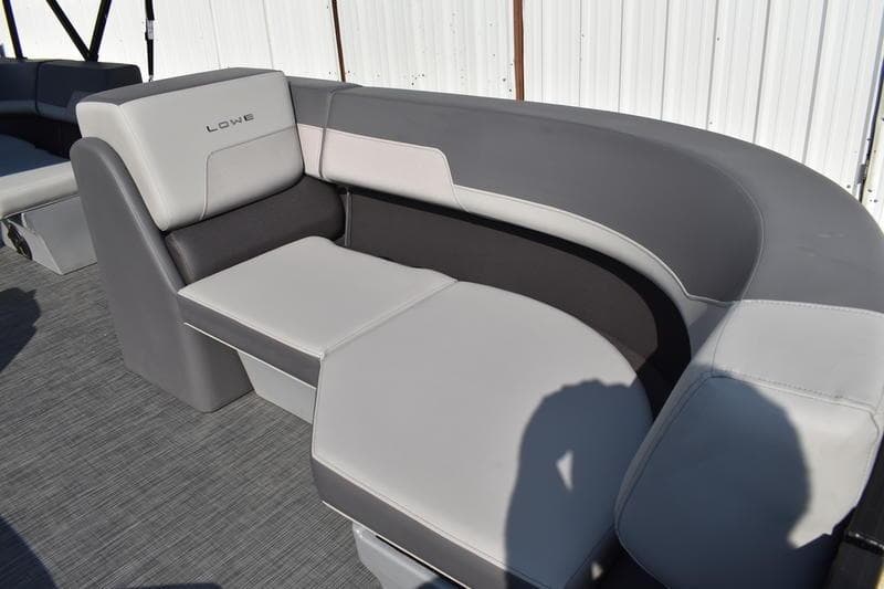 2026 Lowe LS 170 boat interior with gray and white cushioned seating.