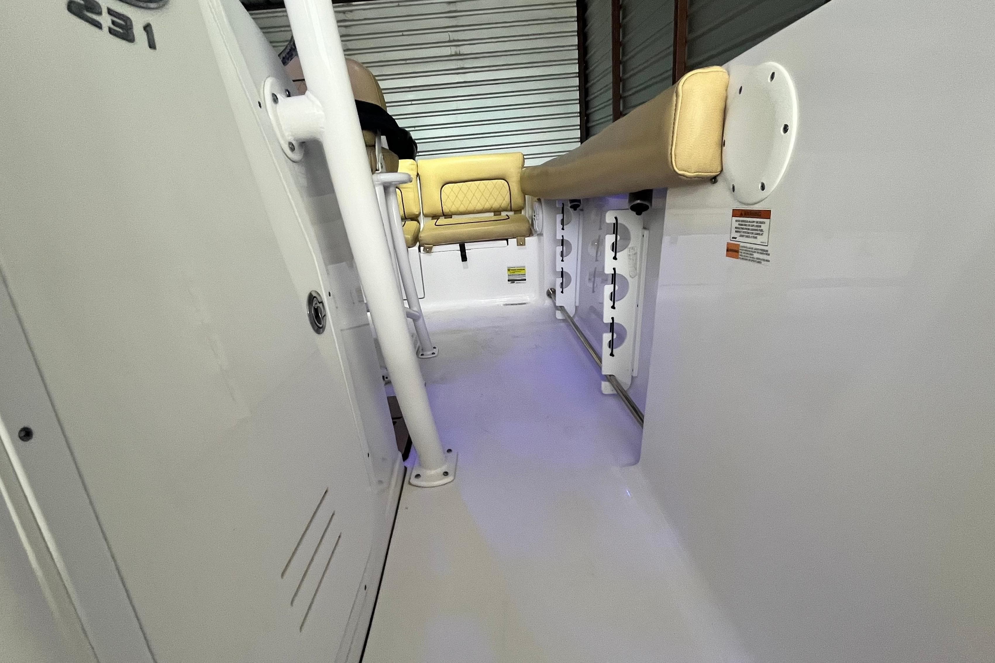 2021 Sportsman Heritage 231 Center Console interior with seating and storage compartments.