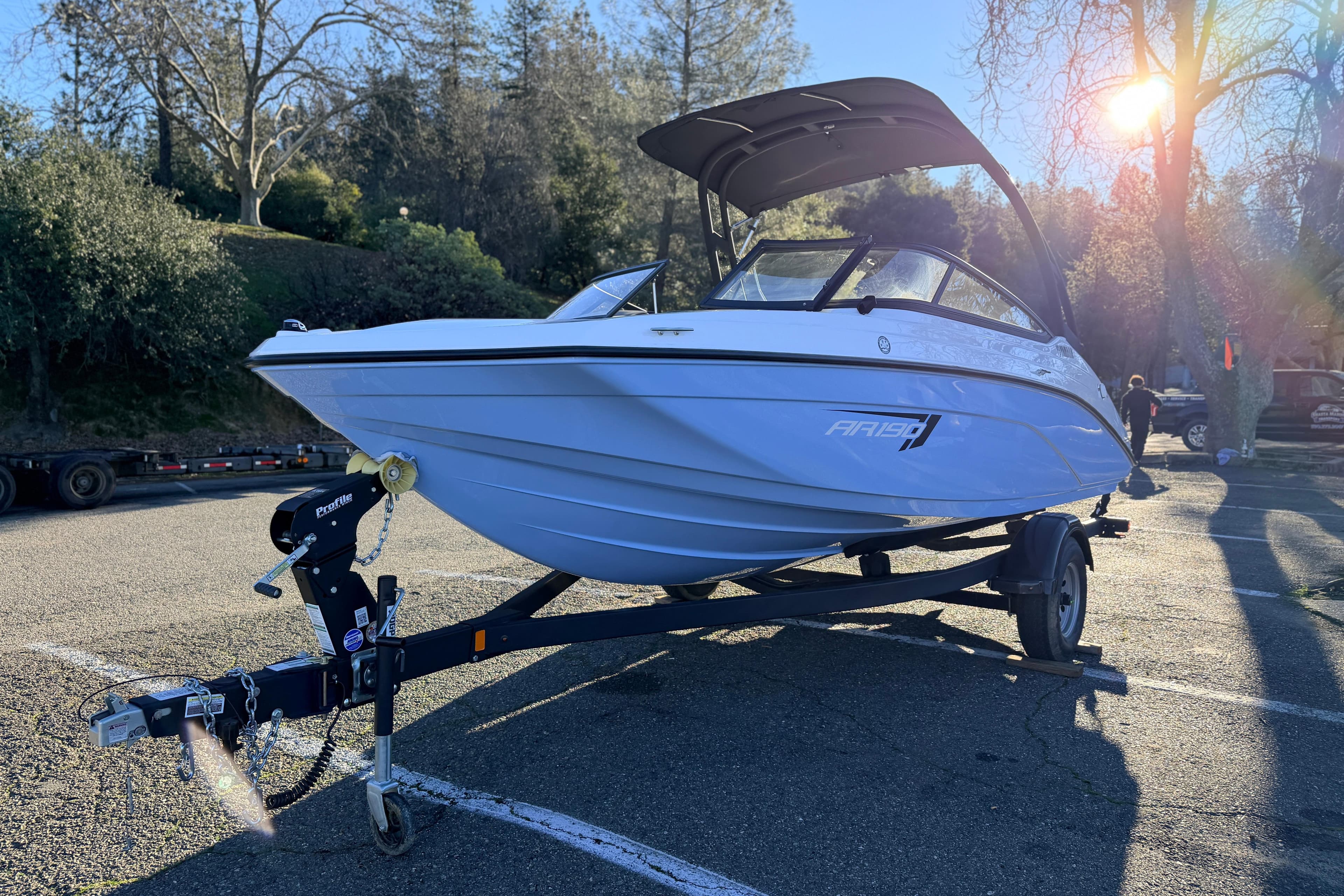 2025 Yamaha Boats AR190 on trailer in sunny outdoor setting.