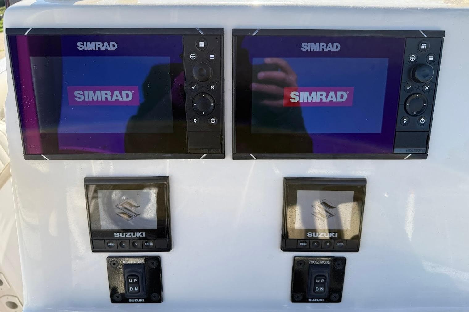 Simrad navigation displays on 2019 Sea Chaser 24 HFC boat dashboard.