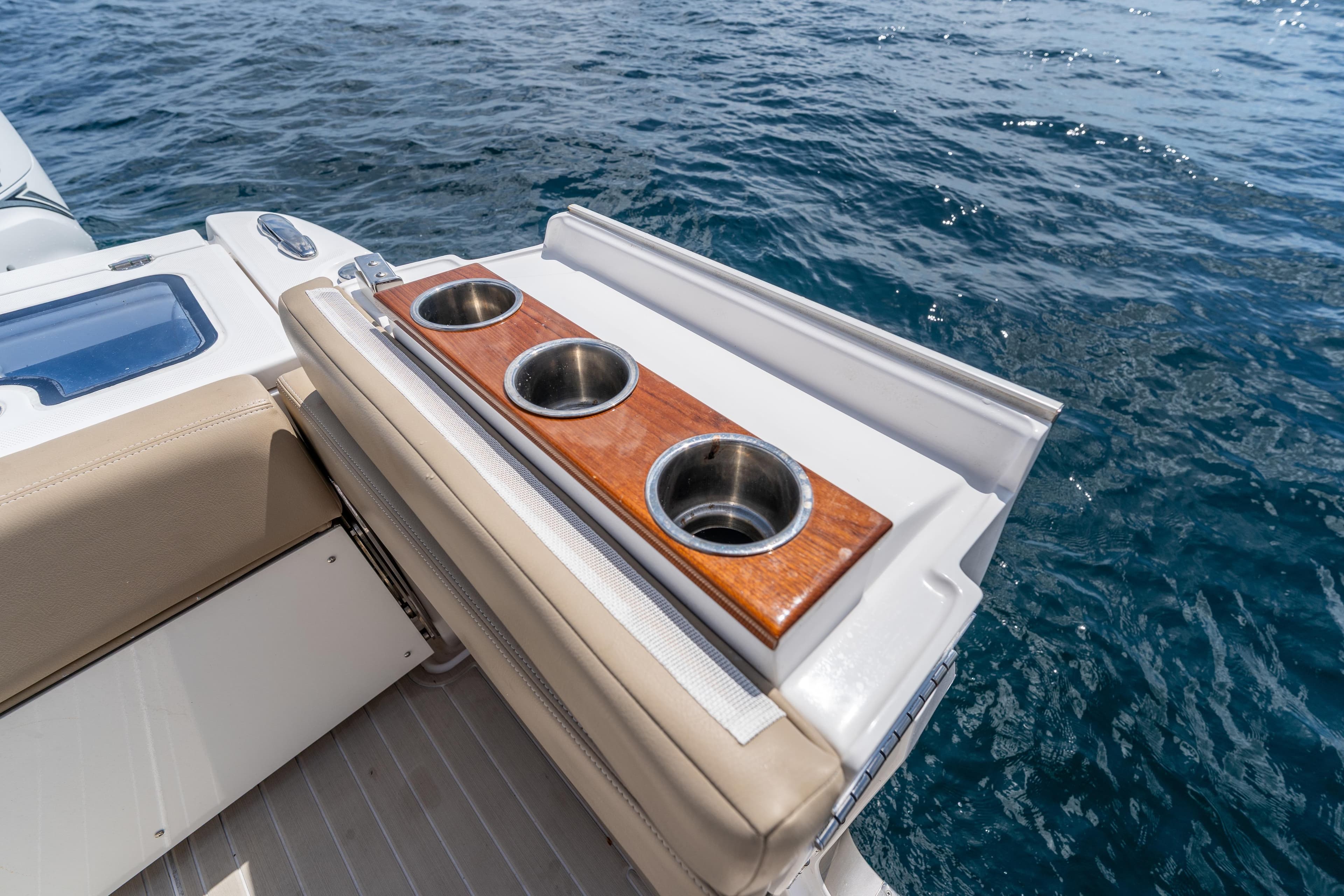 Luxury seating and cup holders on 2021 Everglades 395 Center Console boat.