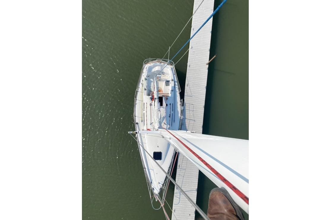 Aerial view of a 1993 Catalina 34 MkII sailboat docked at a marina.