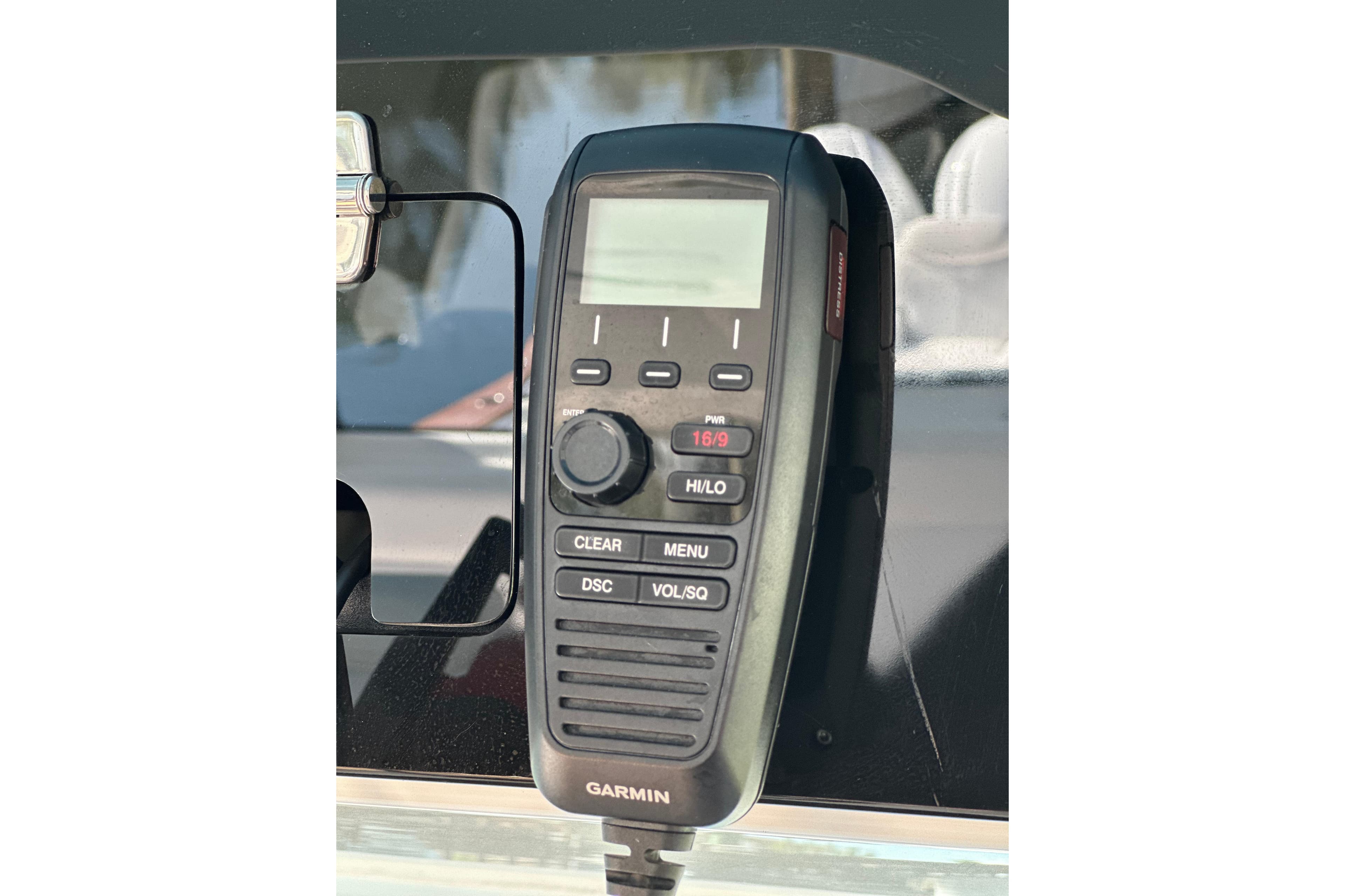 Garmin marine radio on 2021 HCB 65 Estrella boat dashboard.