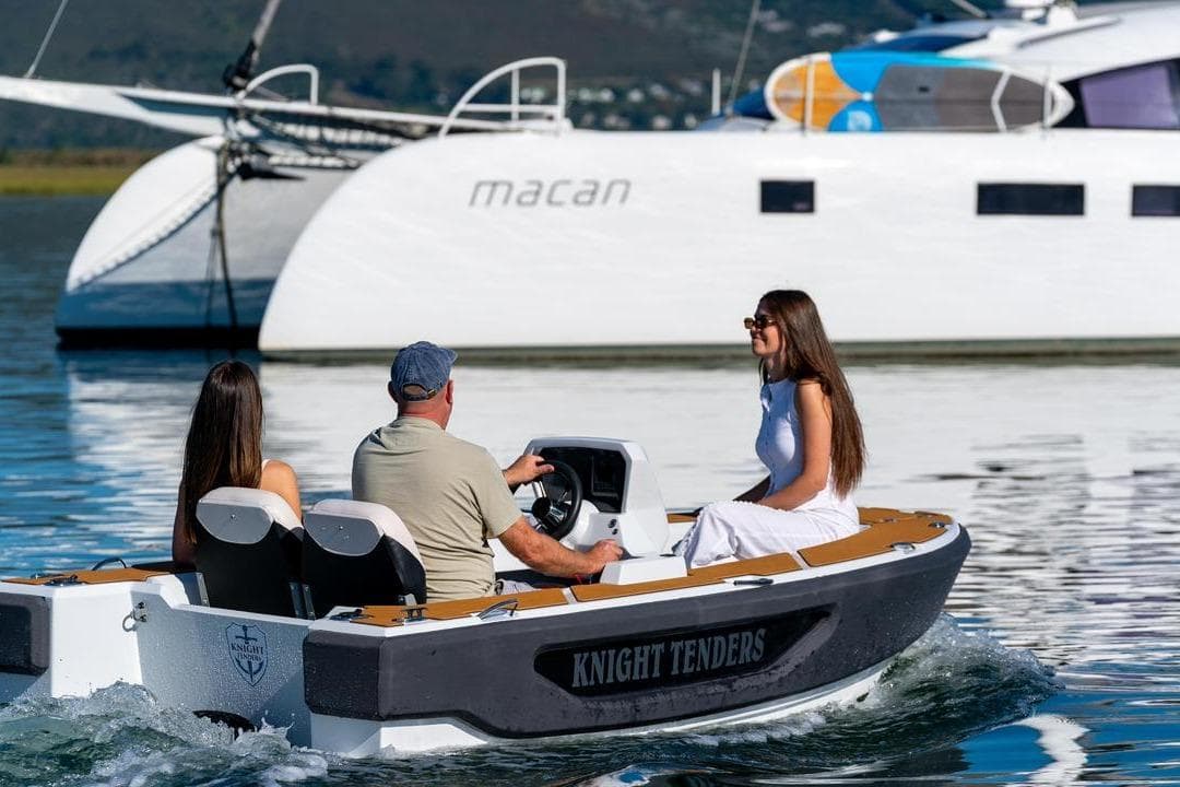 People enjoying a ride on a 2026 Knight Tender Zerojet Electric Center Console boat.