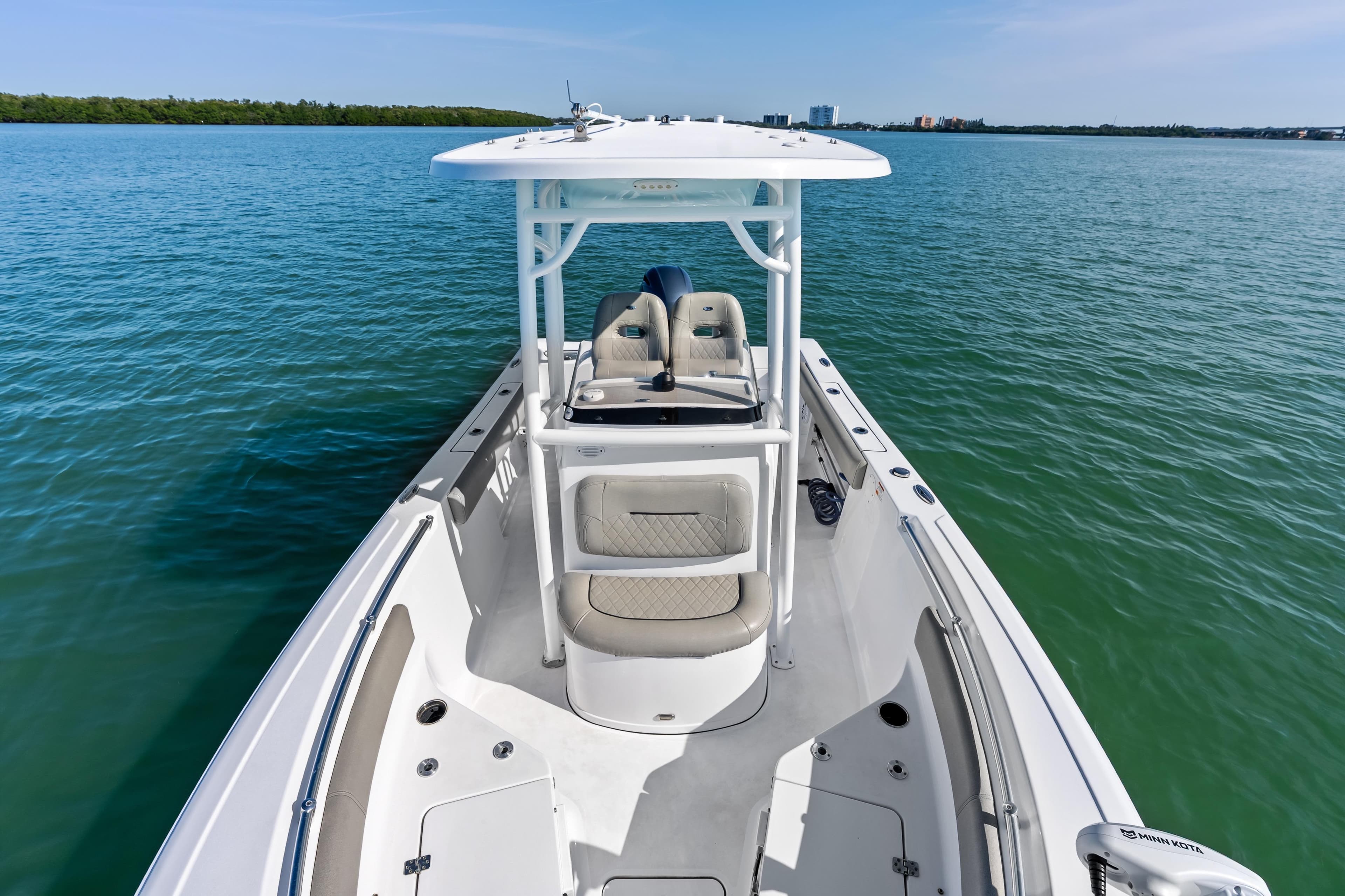 2021 Sportsman Open 212 Center Console boat on calm water.
