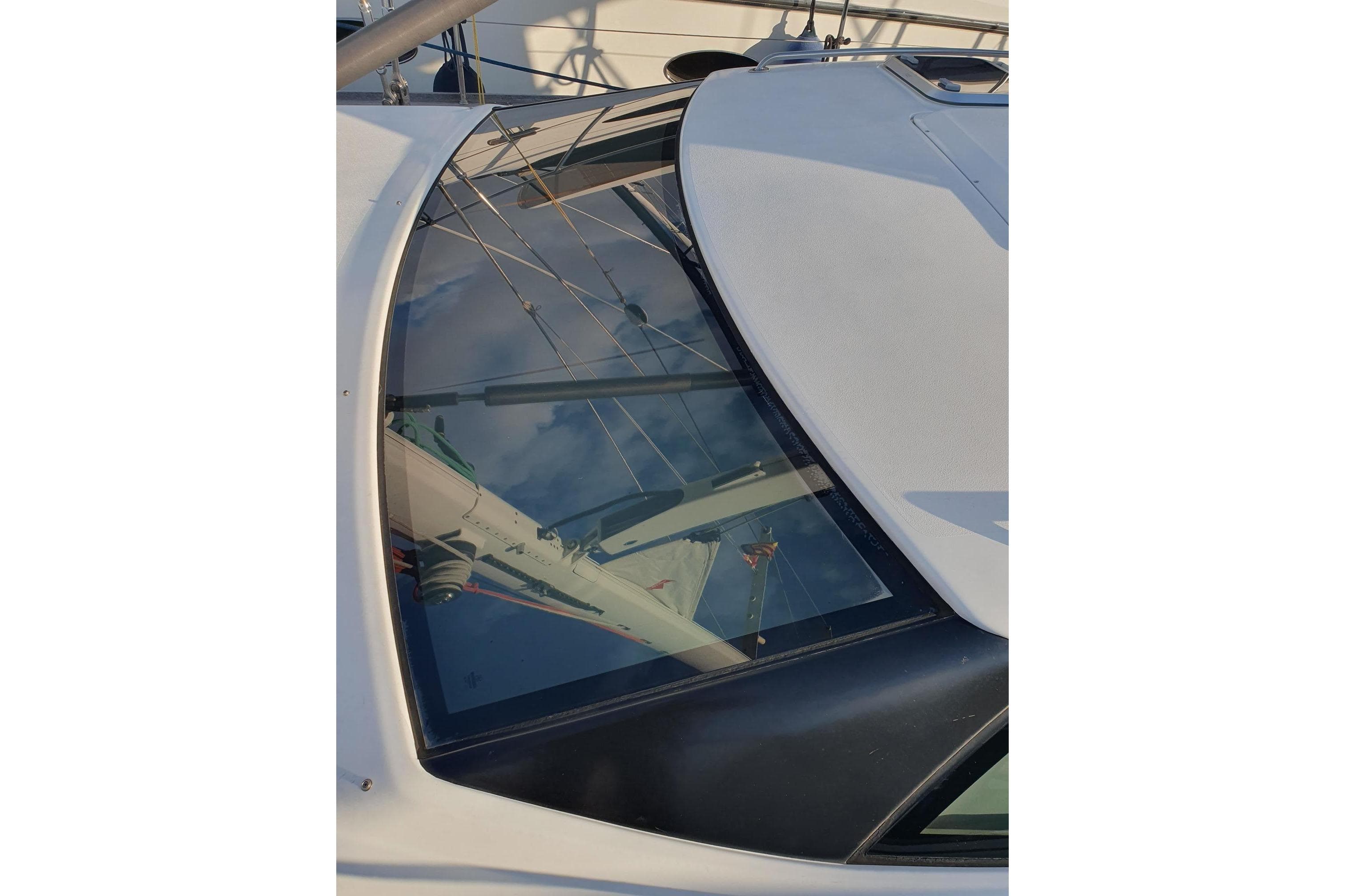 Close-up of 2007 Messrs Solaris Yachts 53DS deck with reflective windows.