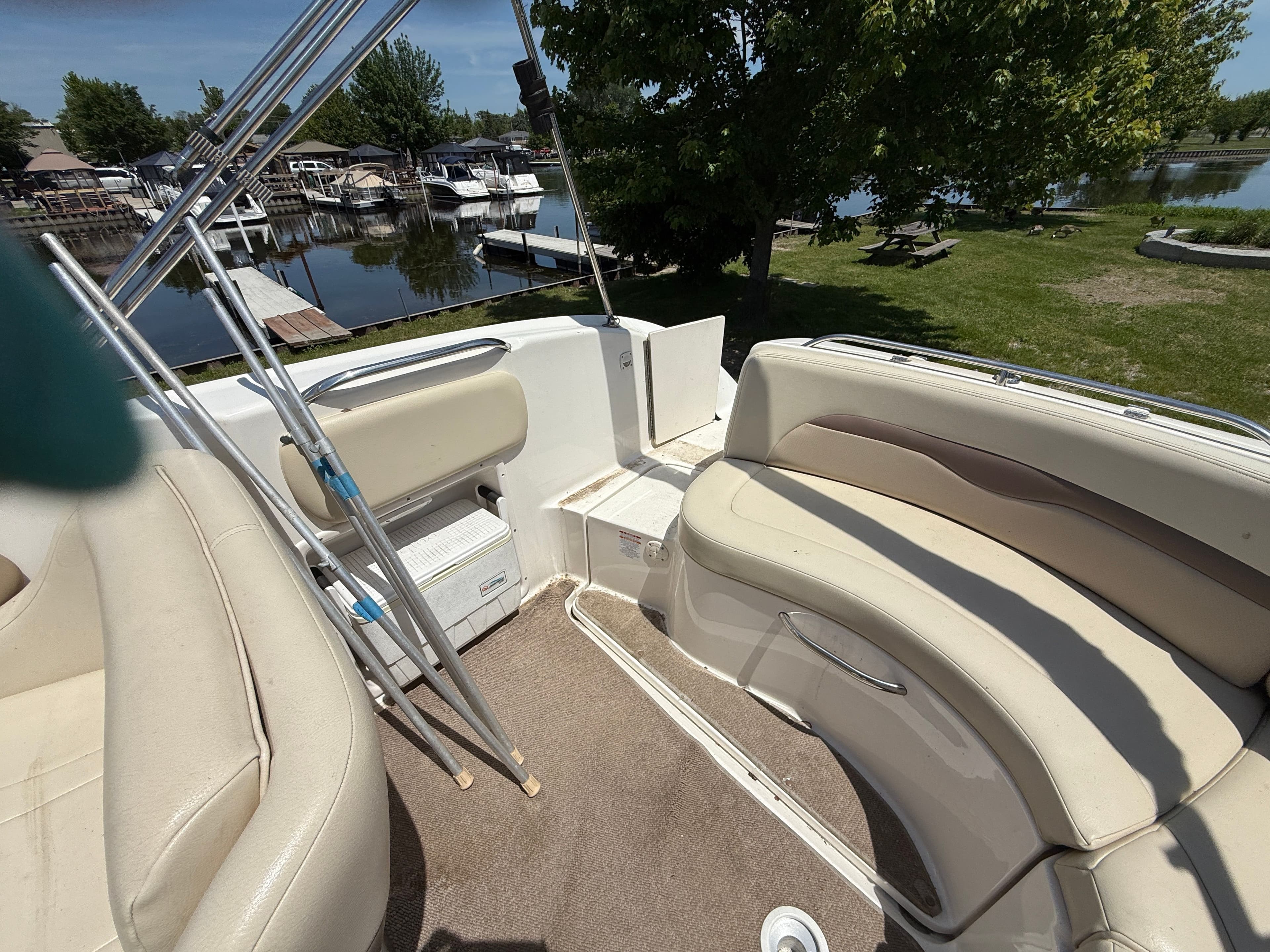 Interior of a 2005 Chaparral 252 Sunsesta boat at the dock.