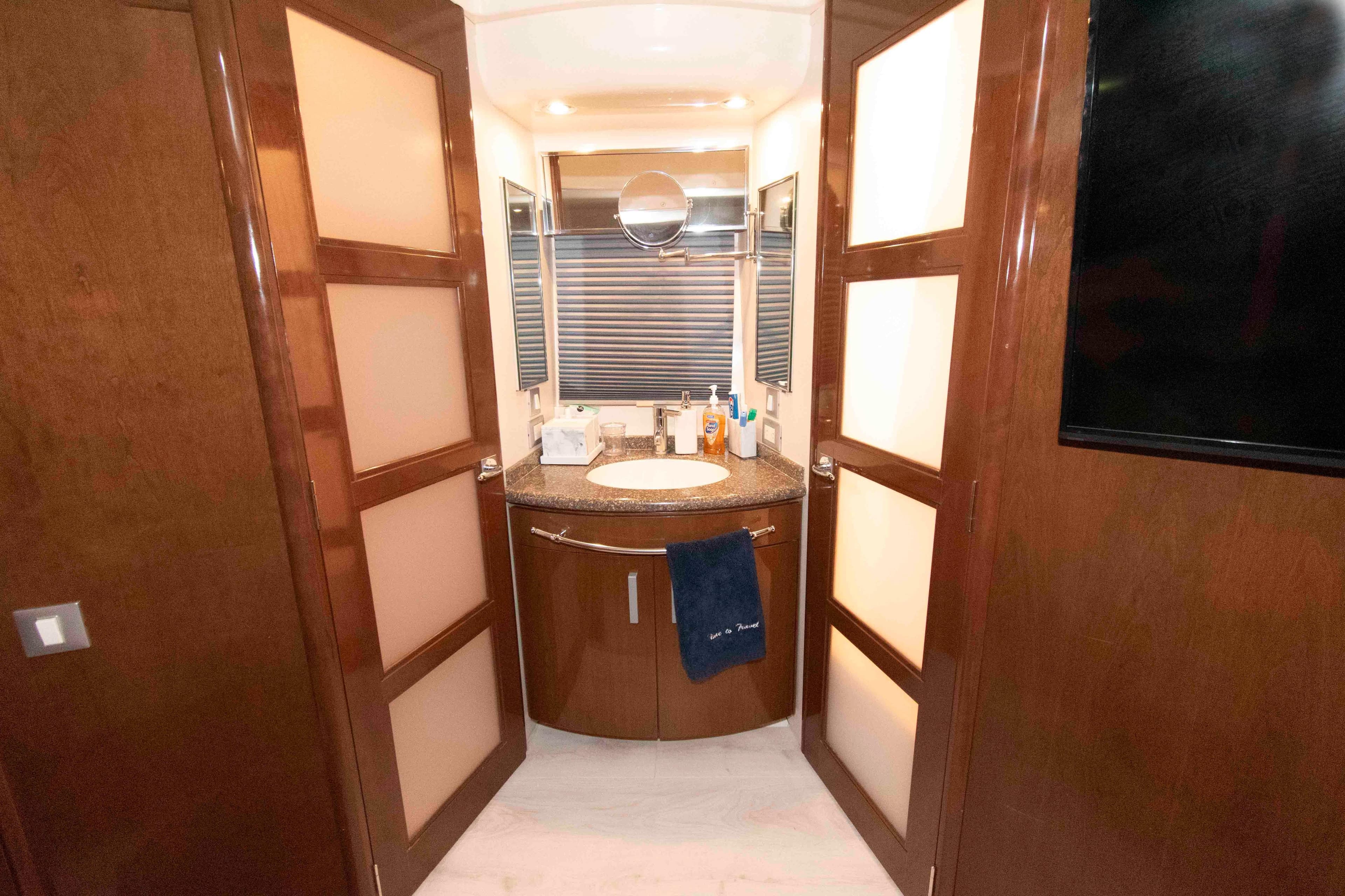 Luxurious bathroom interior of 2007 Carver 56 Voyager yacht with modern fixtures.