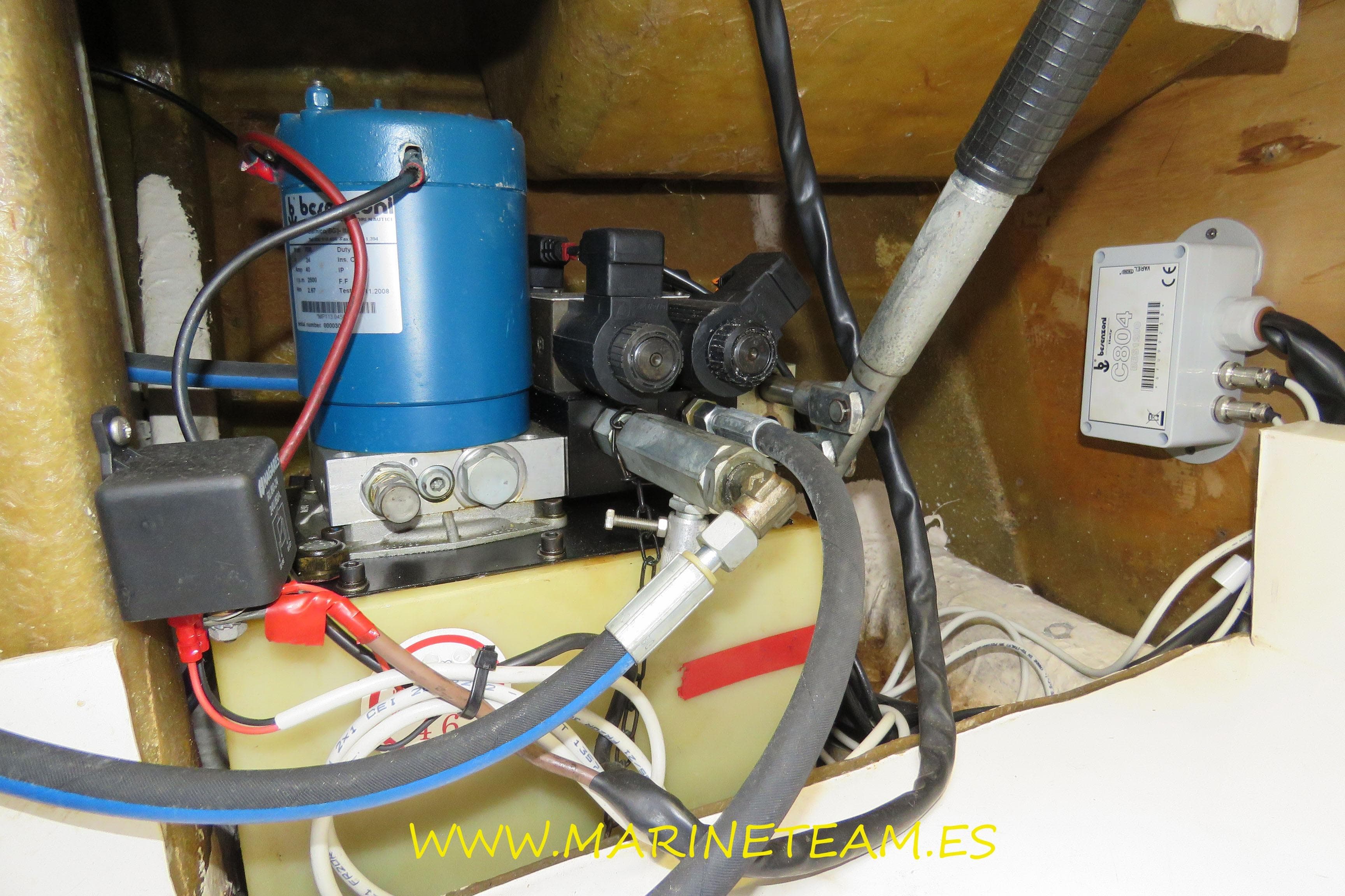 Engine compartment of a 1995 Princess 60 yacht with hydraulic components.