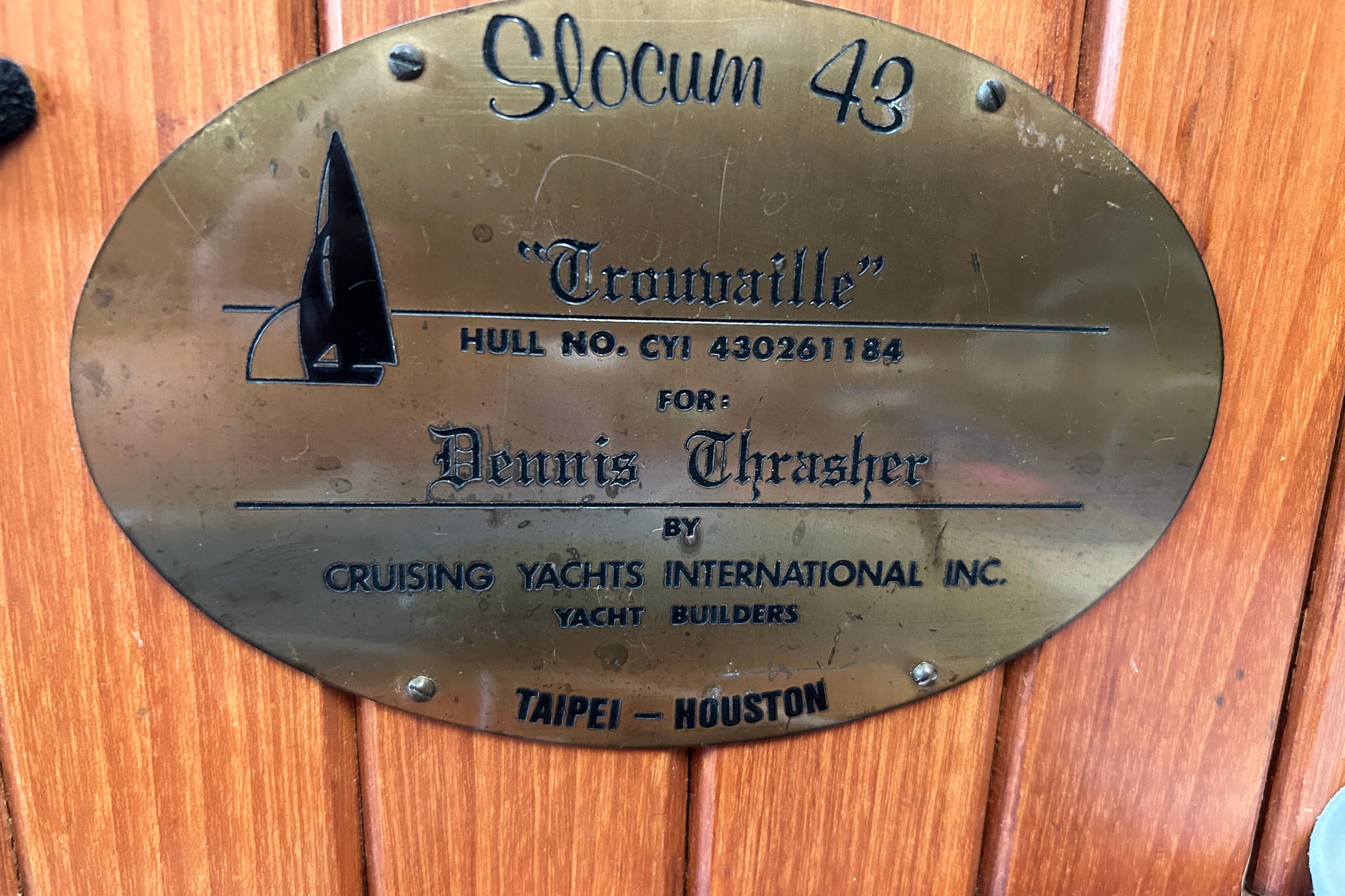 Plaque on Slocum 43 yacht, 1984, displaying hull number and builder details.