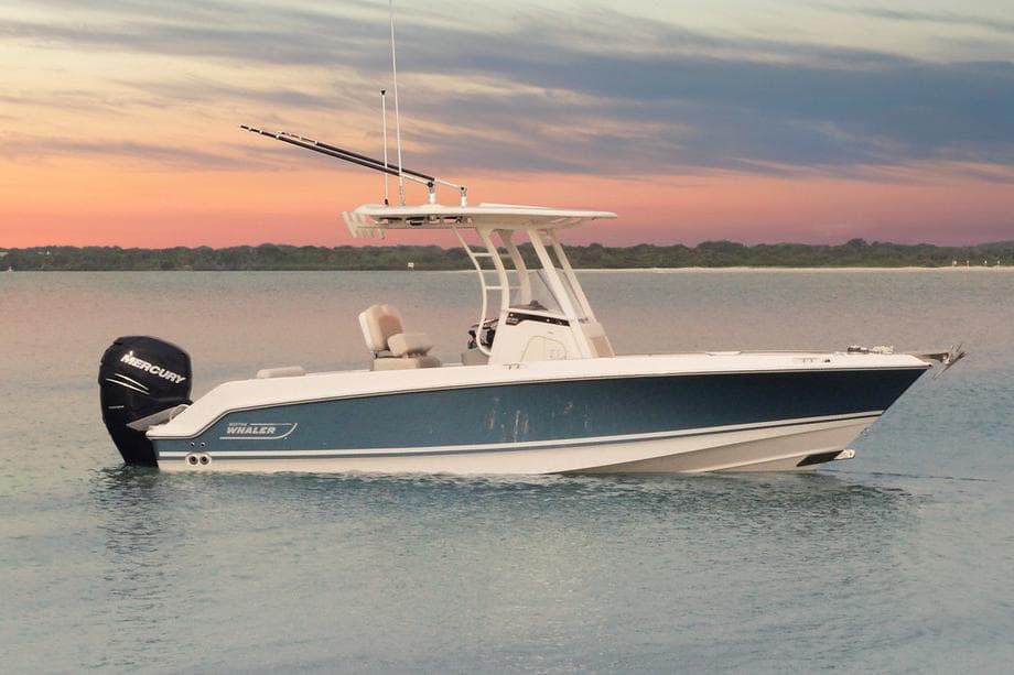 Manufacturer Provided Image: 2025 Boston Whaler 230 Outrage boat on calm water at sunset.