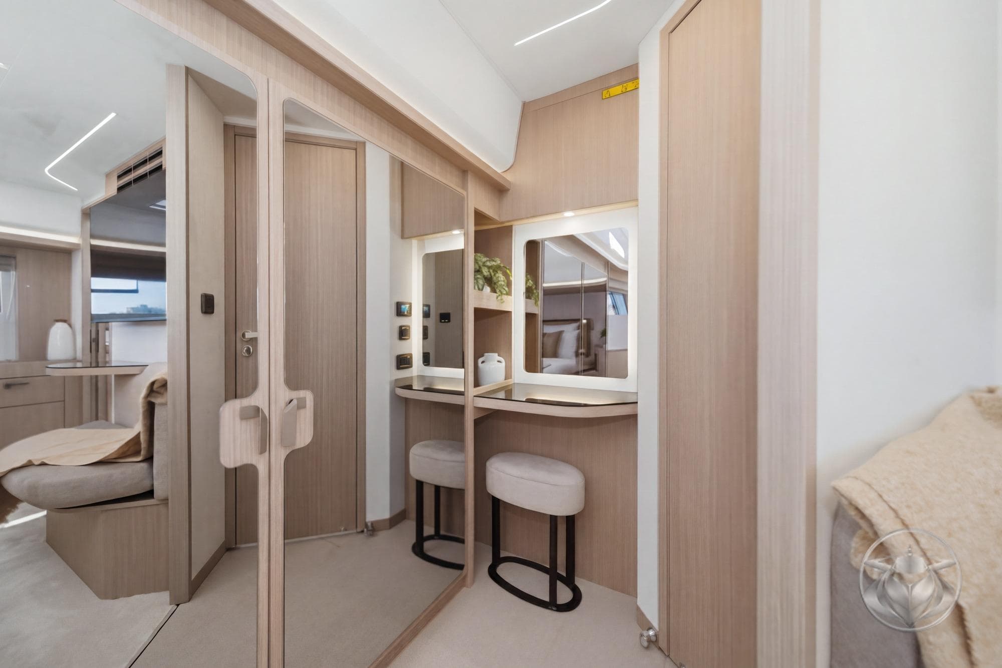 Luxurious interior of 2026 Prestige F5.7 yacht with modern vanity and seating.