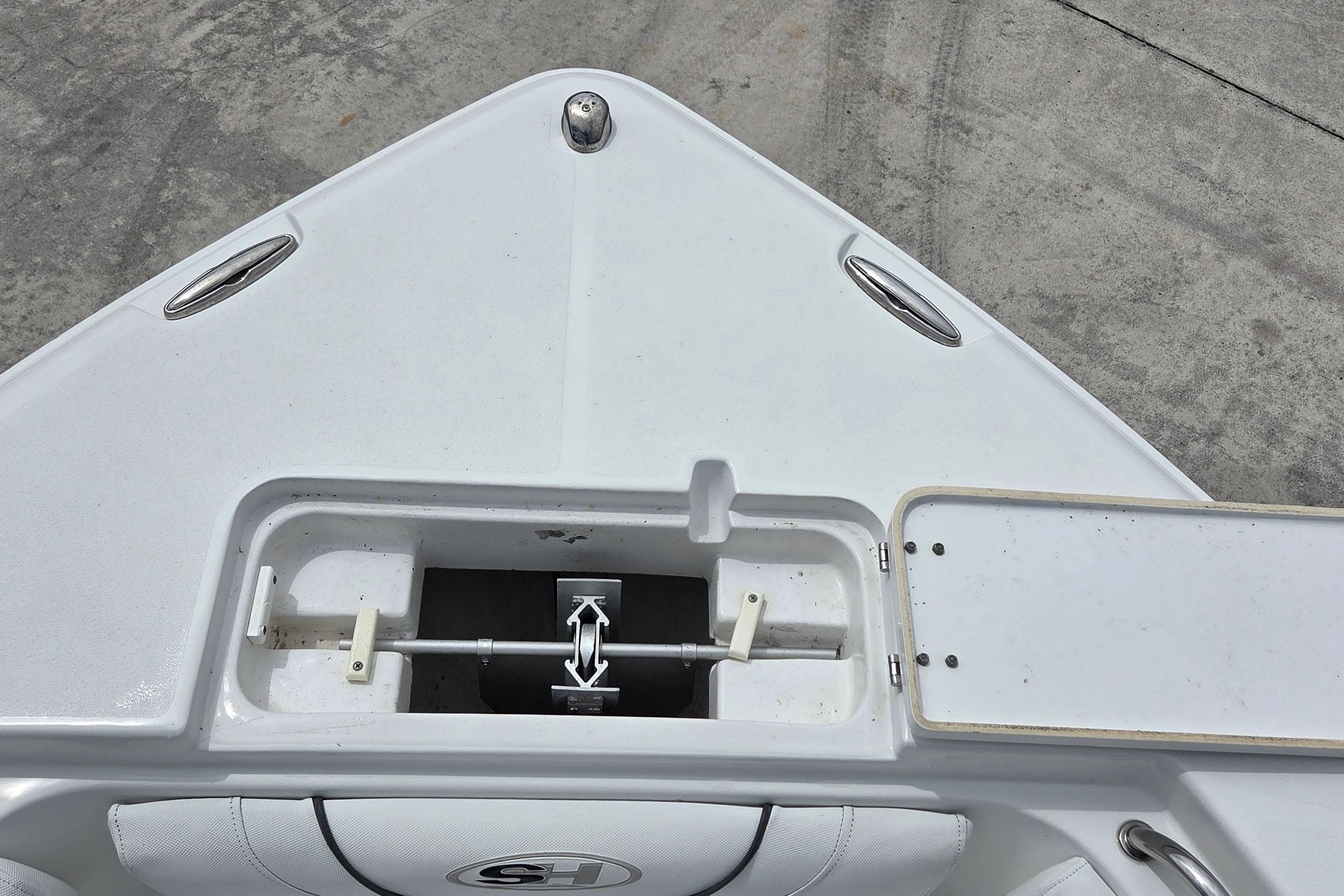 Bow view of a 2017 Sea Hunt Ultra 225 boat with anchor storage.
