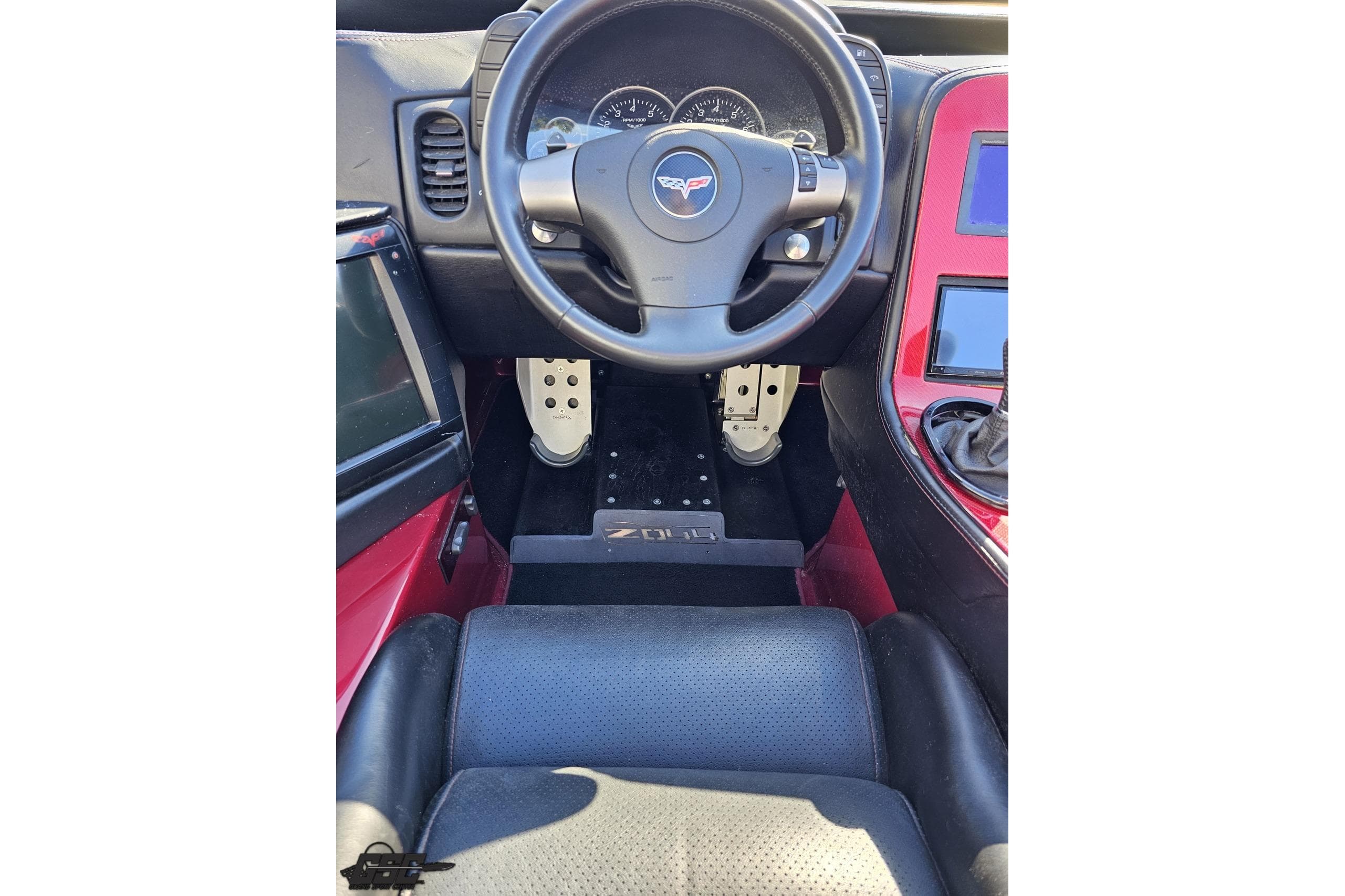 Interior view of a 2010 MTI 44 Corvette, featuring steering wheel and dashboard.
