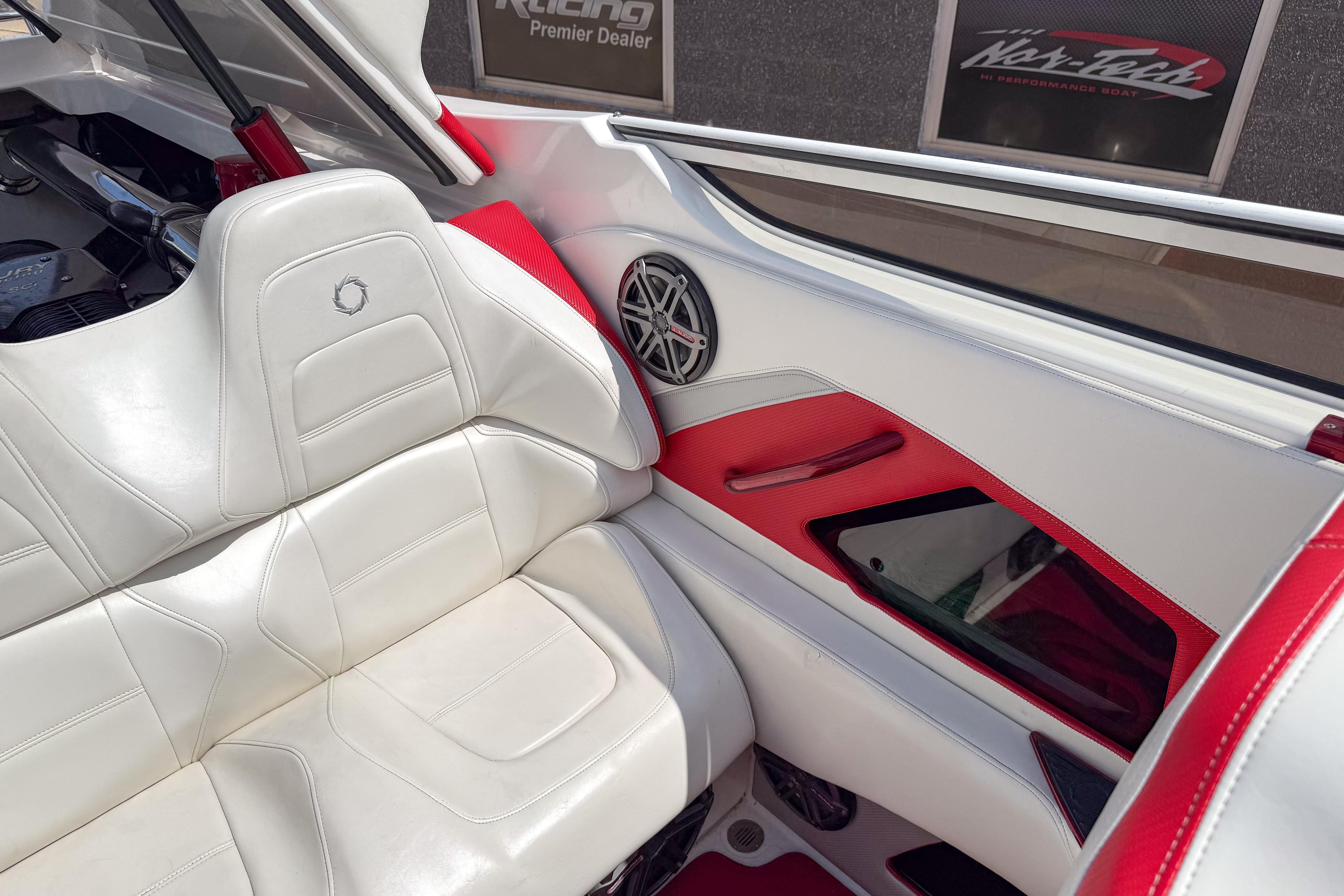 Interior of 2007 Fountain 42 Lightning boat with white and red seating.