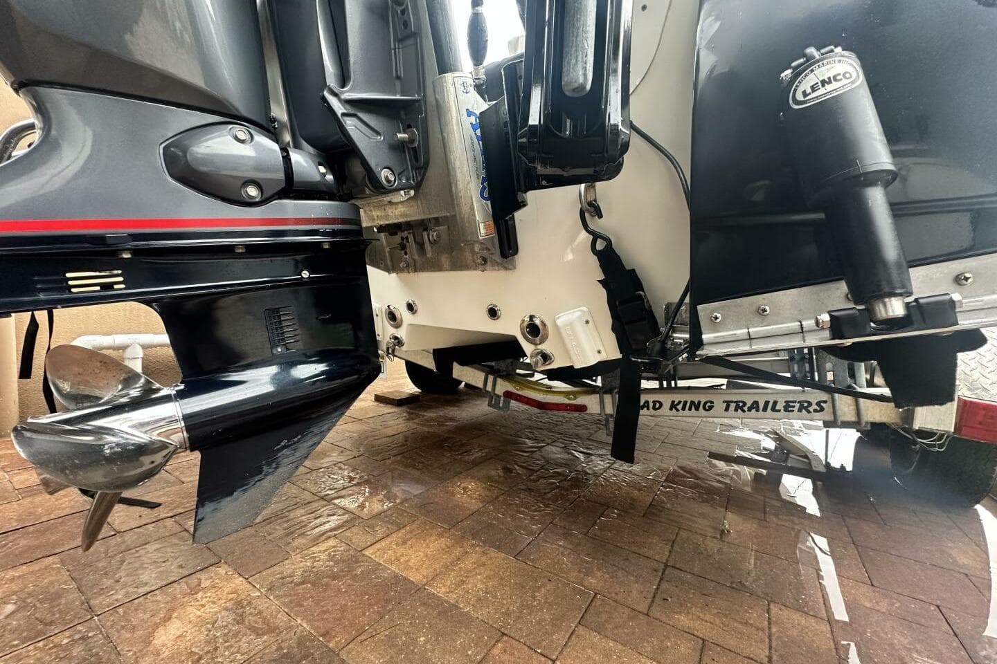 2020 NauticStar 2140 Sport Shallow Bay boat engine and trailer detail.