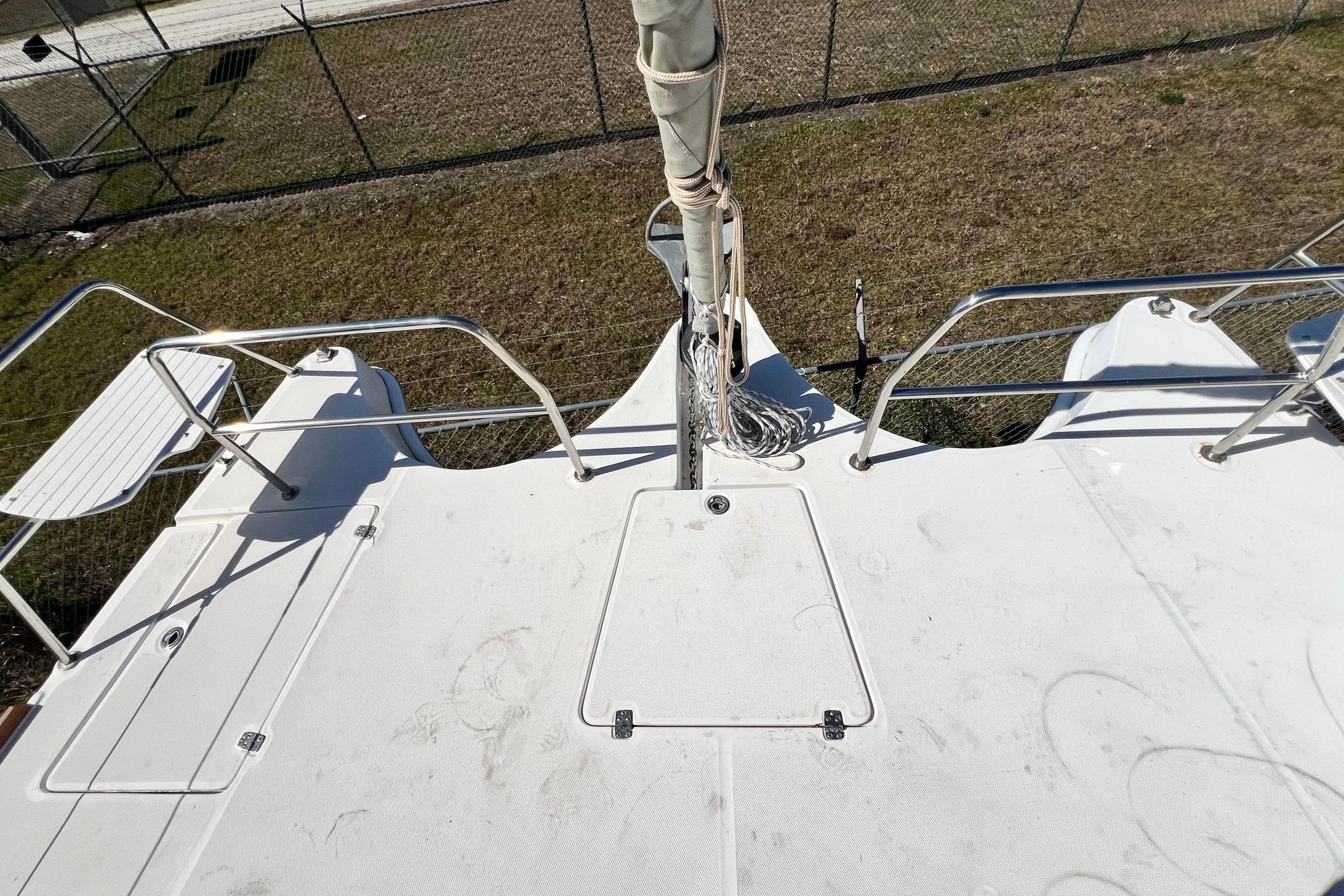 Deck view of 2013 Gemini Legacy 35 catamaran, featuring railings and seating.