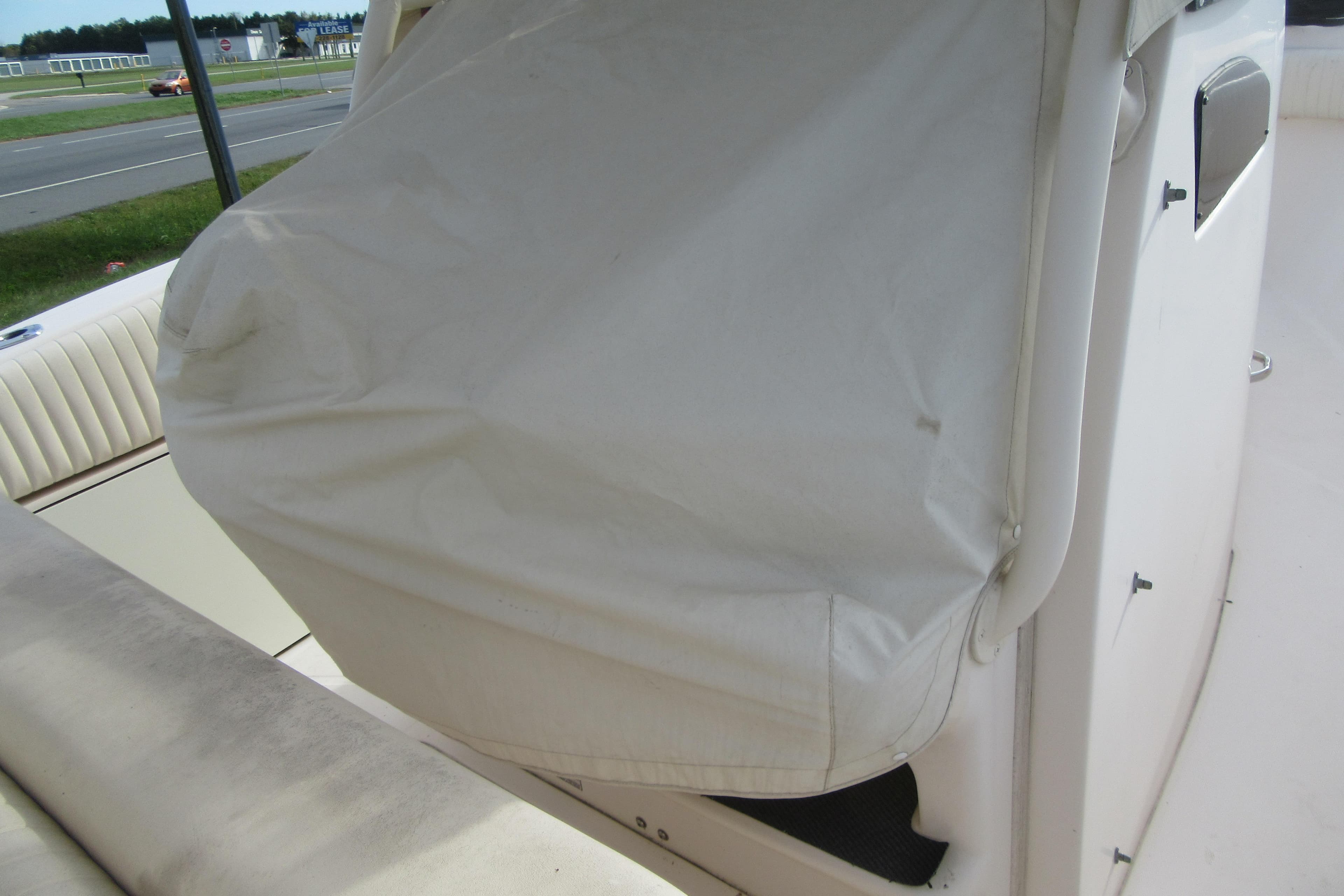 2012 Grady-White Canyon 271 boat interior with covered seating area.