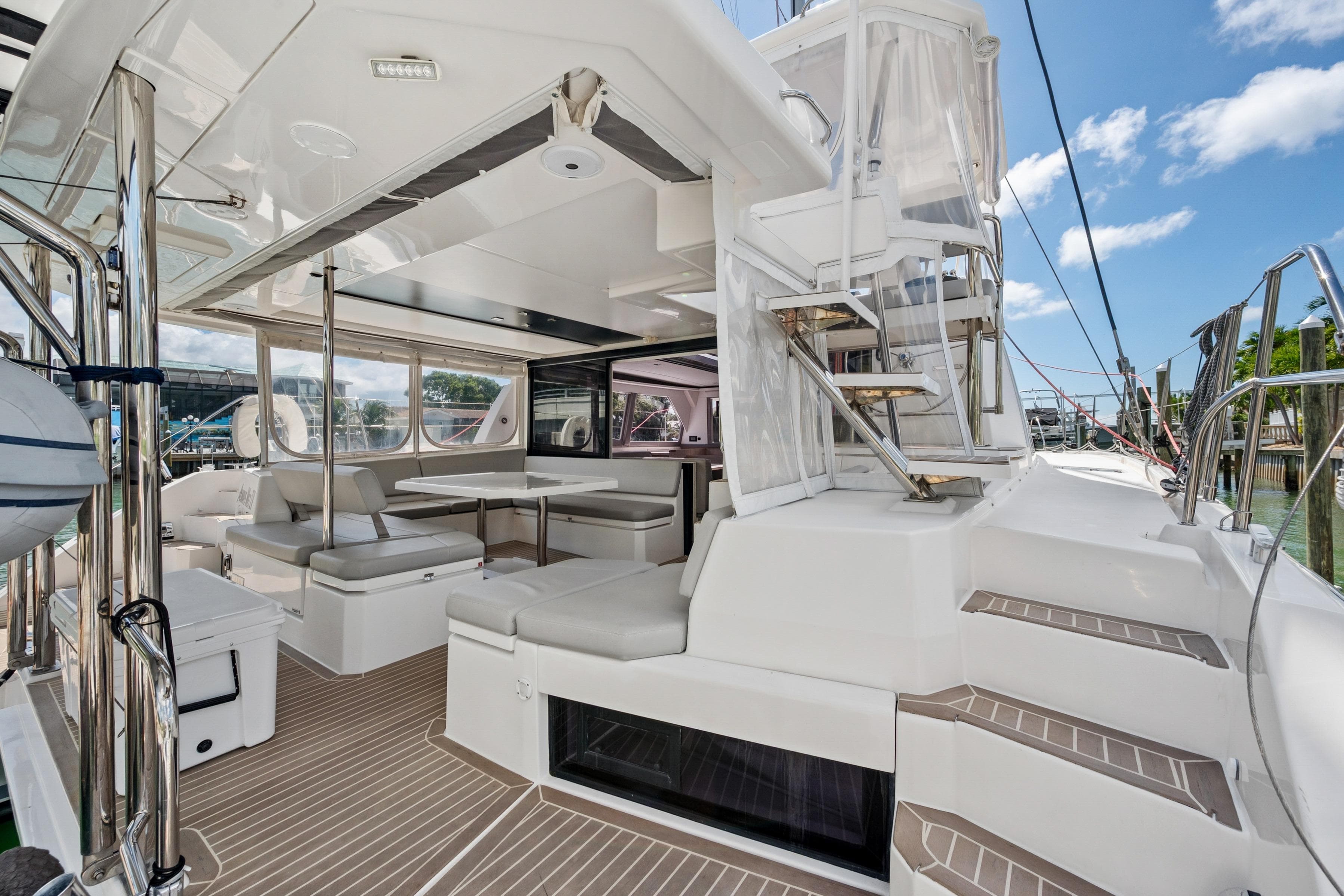 Luxurious 2021 Leopard 45 catamaran with spacious outdoor seating and modern design.