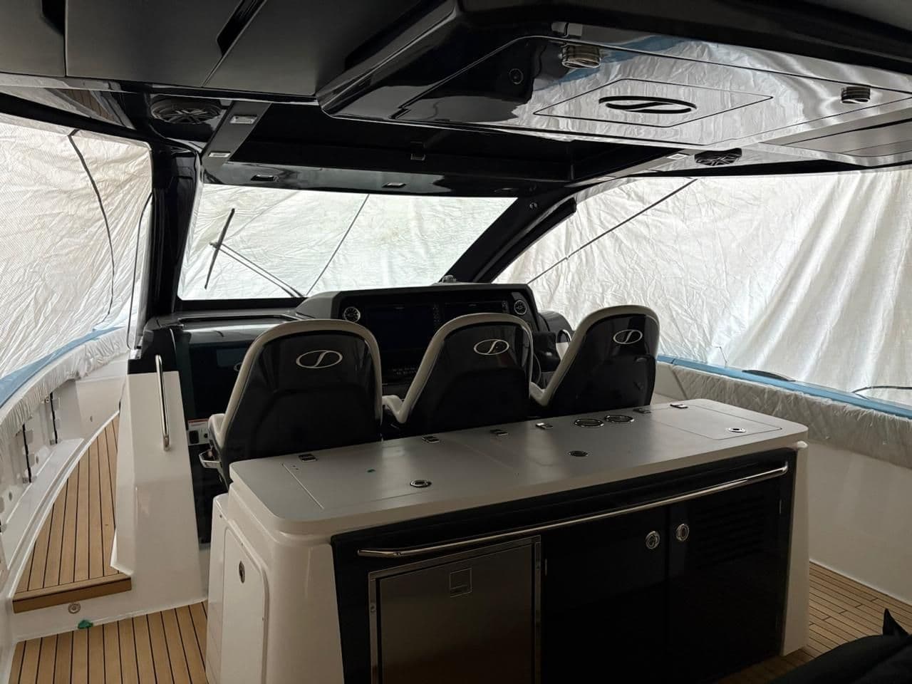 Interior of Schaefer V44 yacht, 2026 model, featuring modern seating.