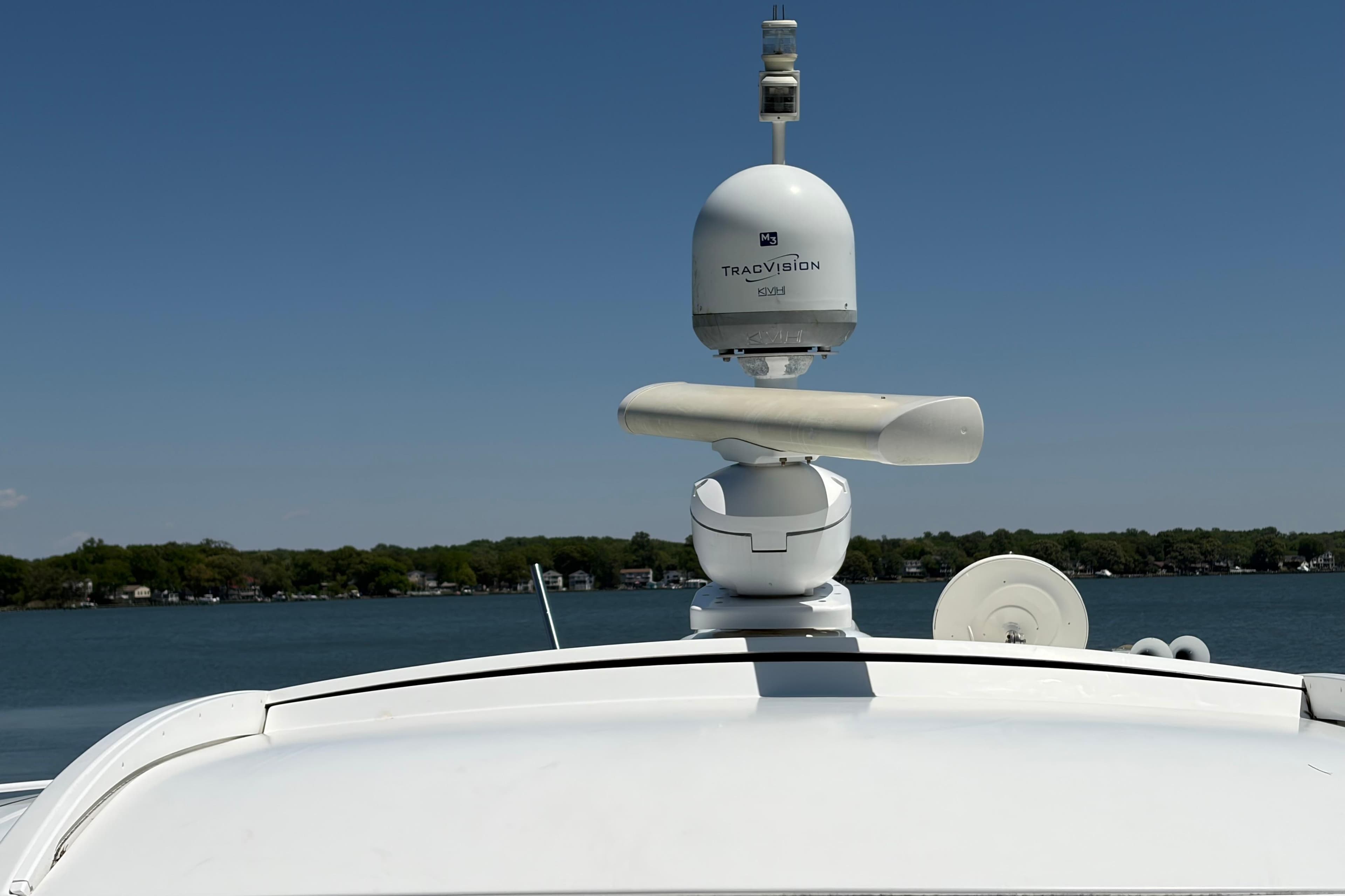 2011 Formula 45 Yacht with TracVision satellite, lake view in background.