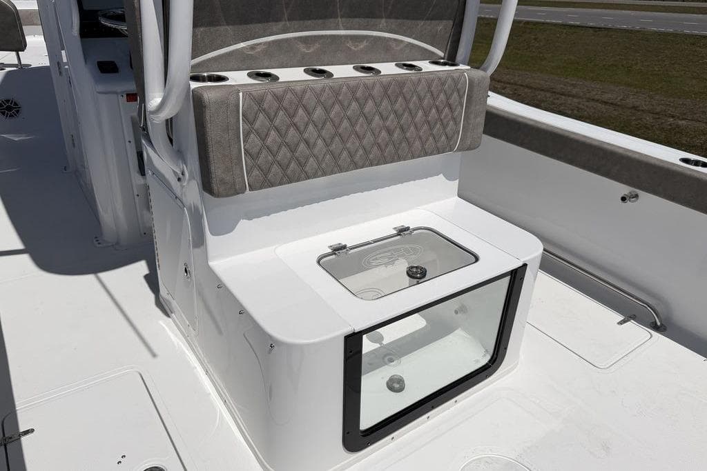 2026 Sea Hunt Gamefish 30 boat interior with forward seating and storage compartment.