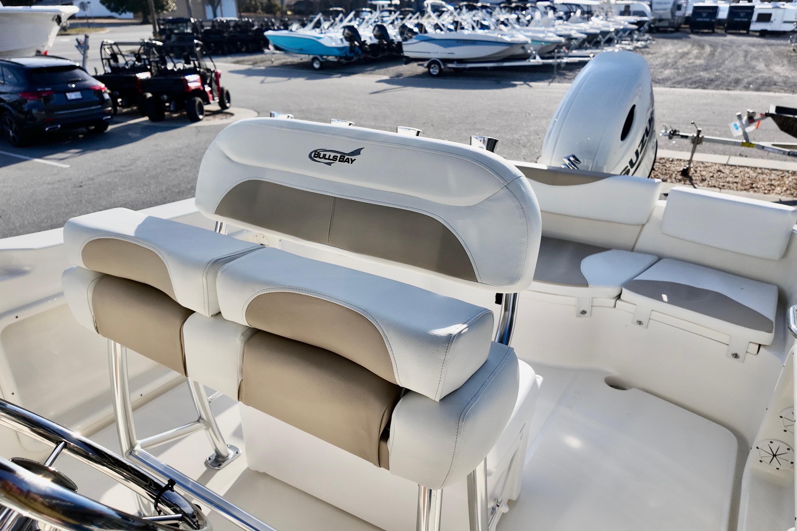 2026 Bulls Bay 230 Center Console boat interior with seating and steering wheel.